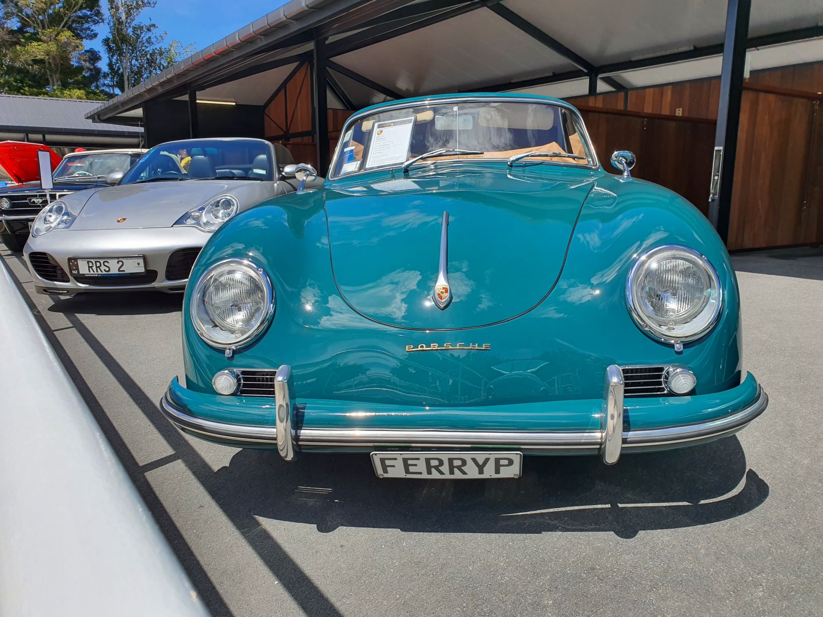 Two Porsches including a turquoise 356A Spider