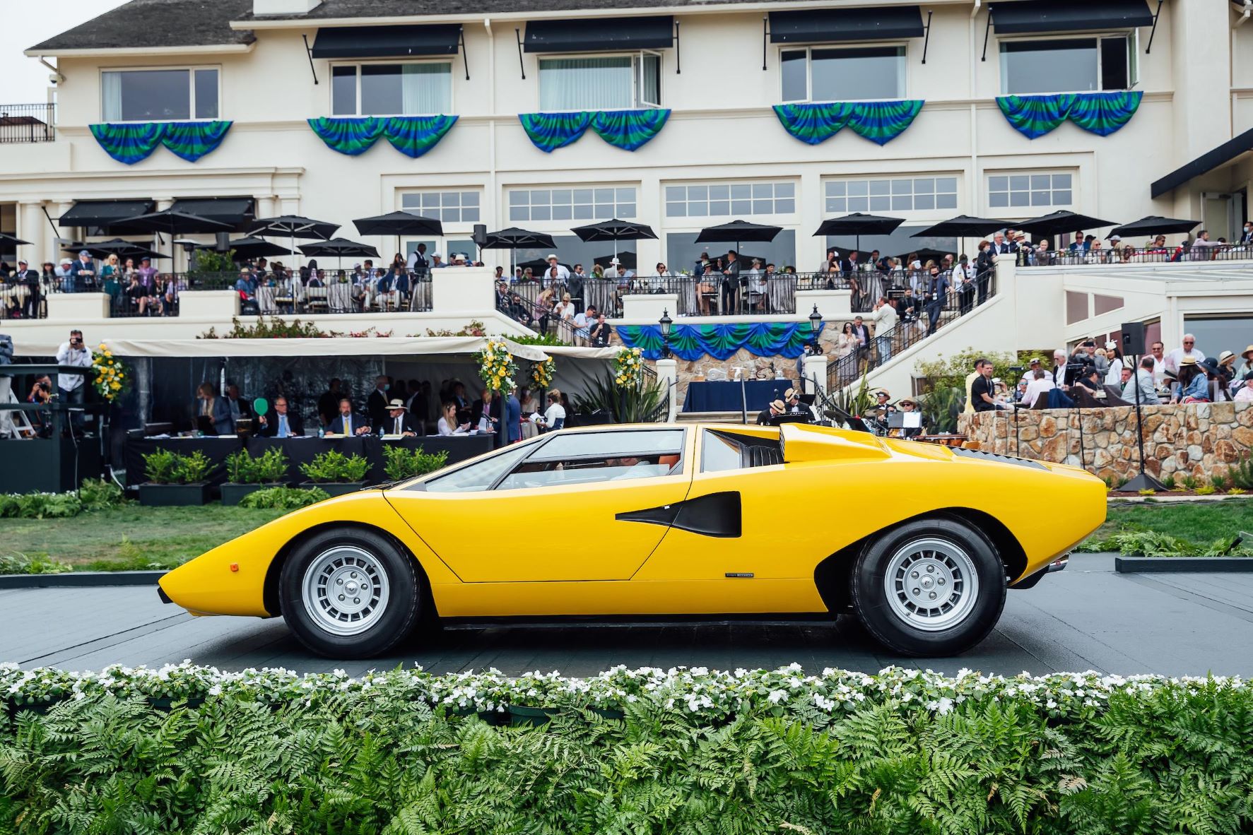 A yellow Lamborghini Countach Periscopio