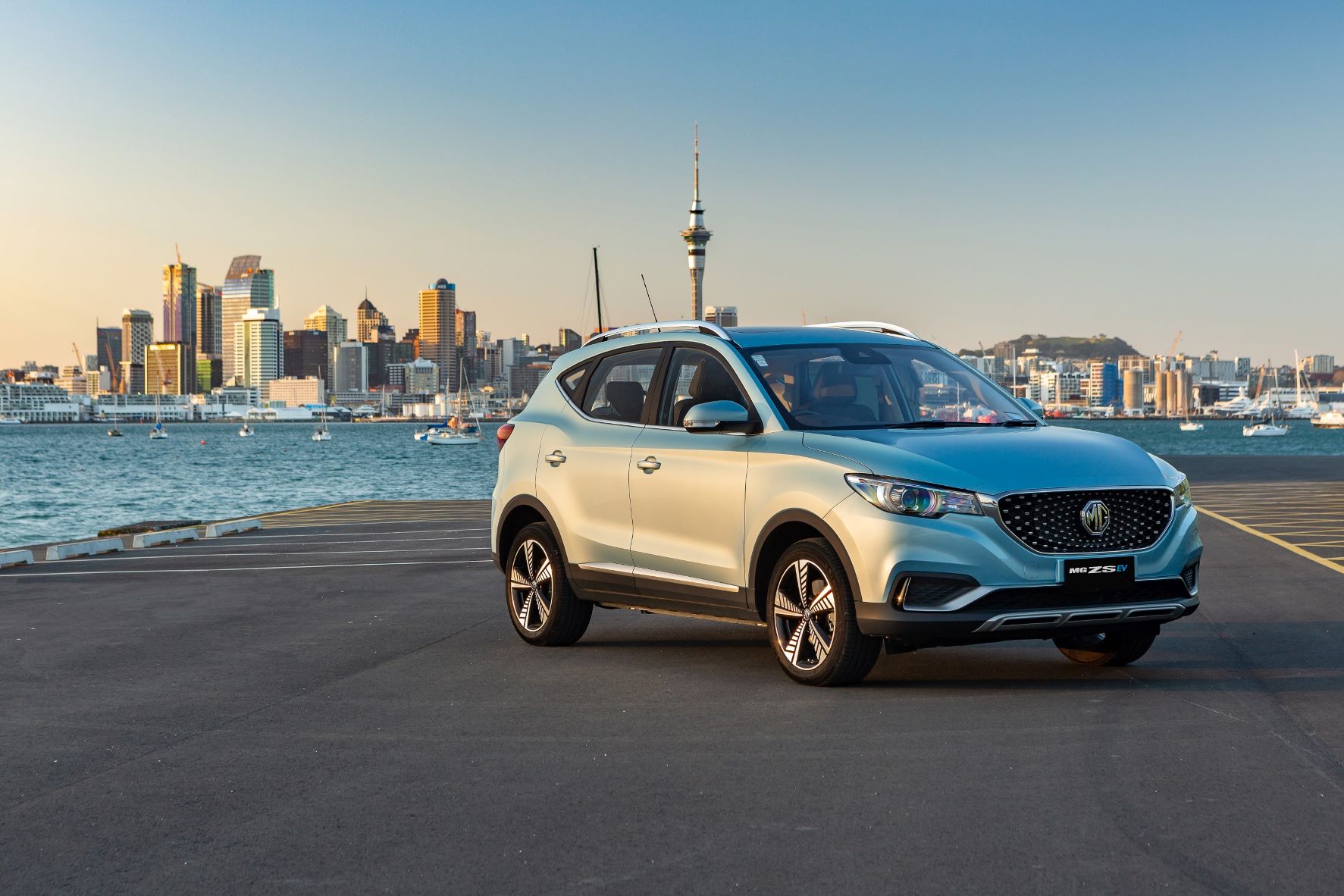 MG ZS EV with Auckland in the background