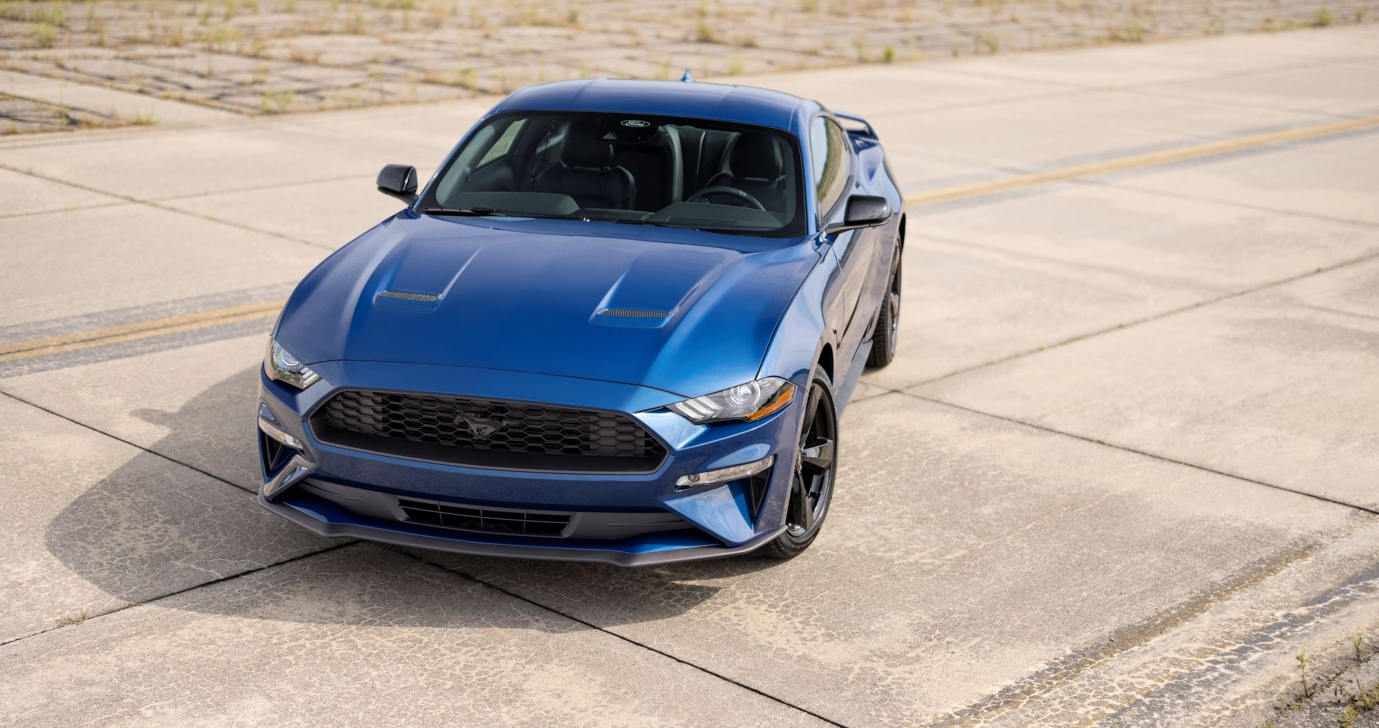 Front three quarter view of the 2022 Ford Mustang Stealth Edition in Atlas Blue