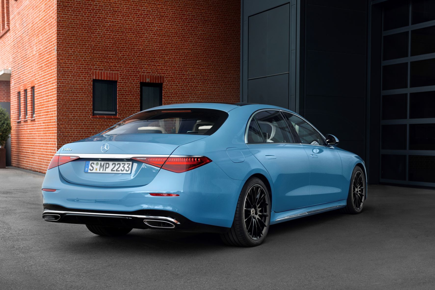 Rear three quarters view of the new Mercedes-Benz S-Class in blue
