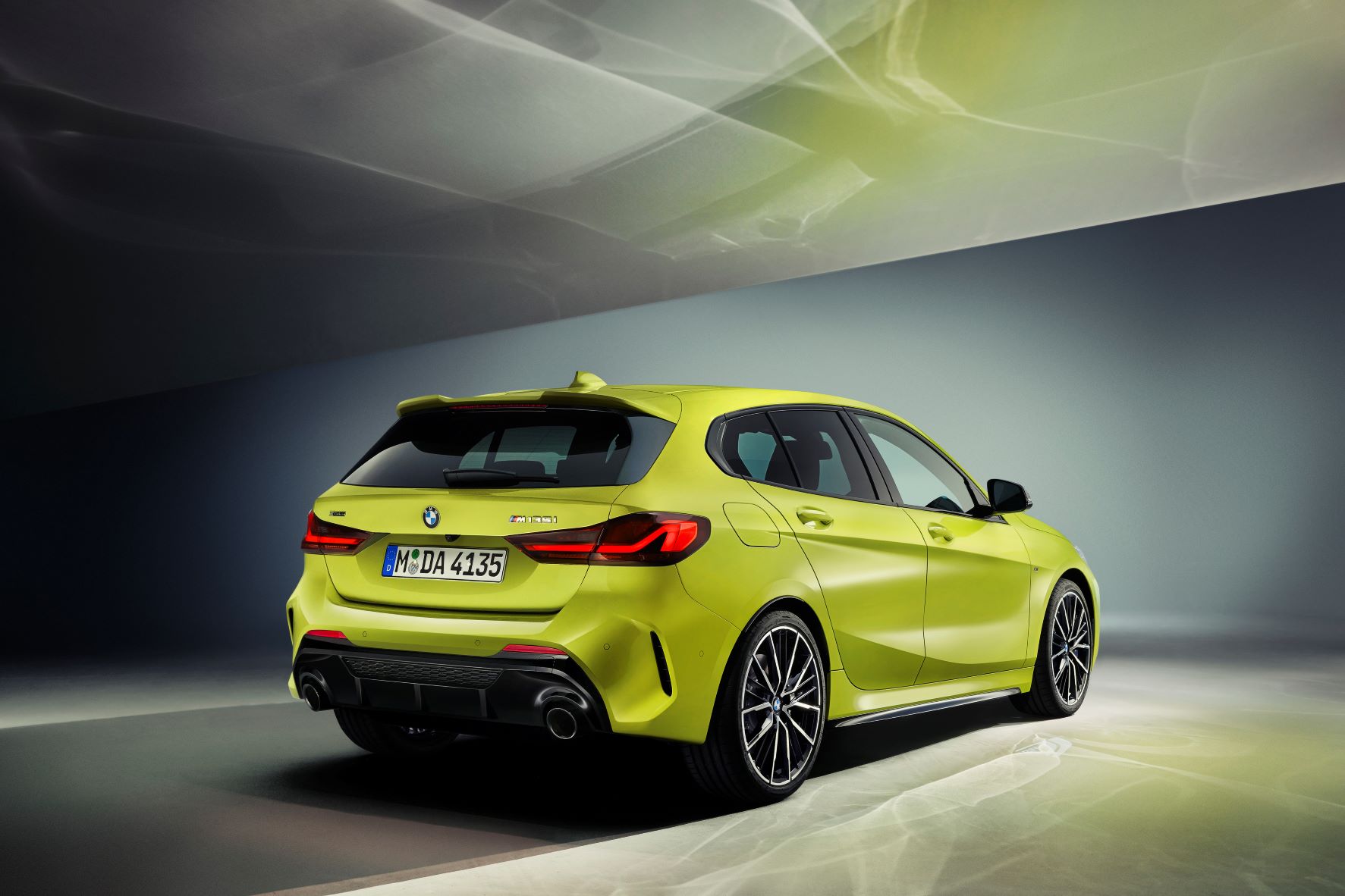 Rear three quarters view of the new BMW M135i in Sao Paulo yellow