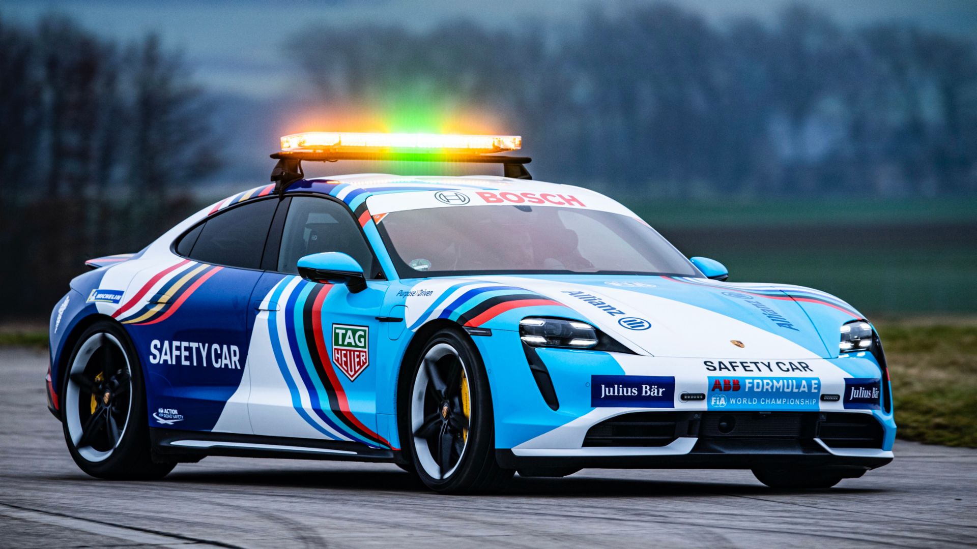 Porsche Taycan Turbo S safety car going sideways