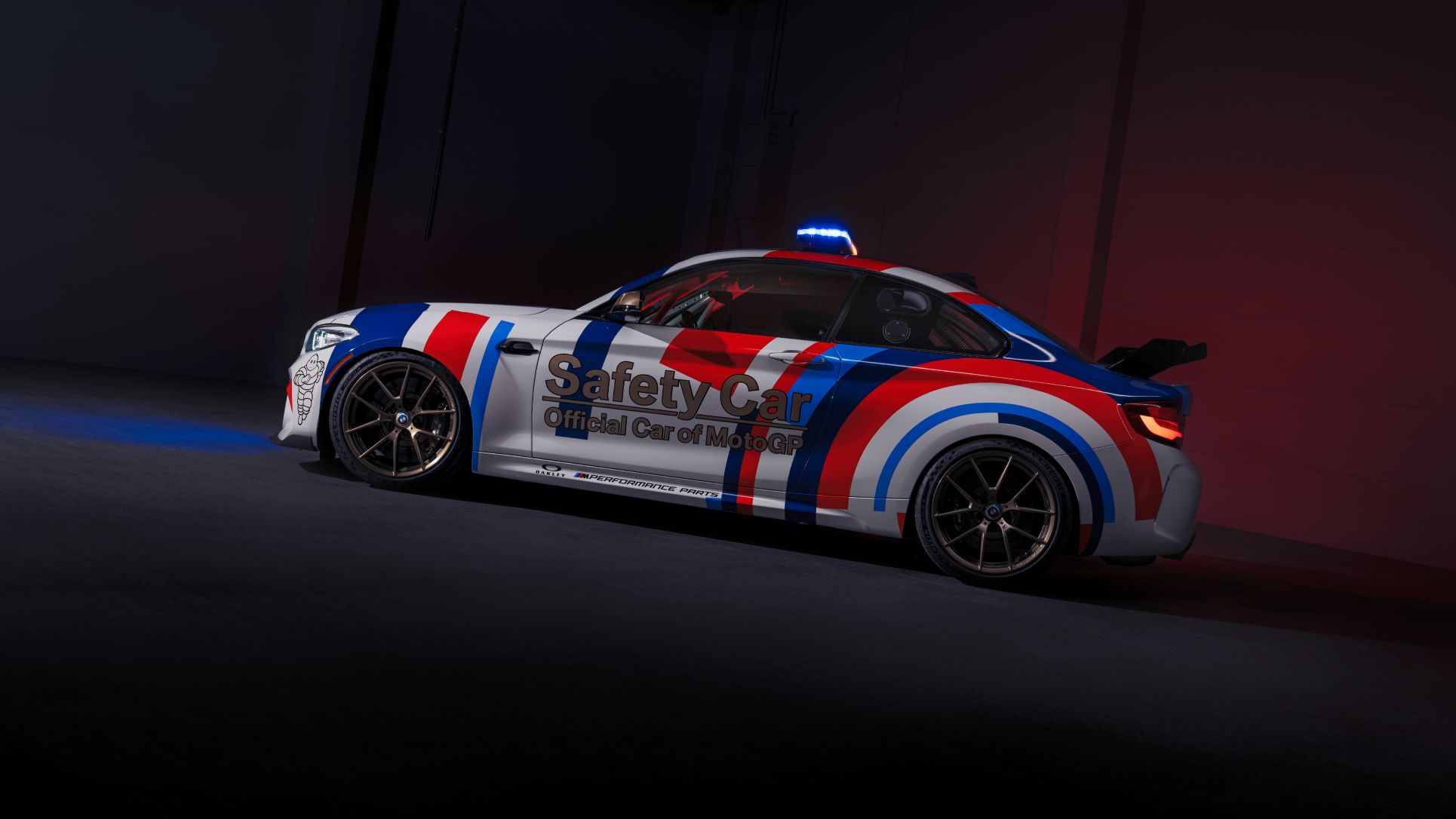A side view of the BMW M2 CS Racing MotoGP Safety Car