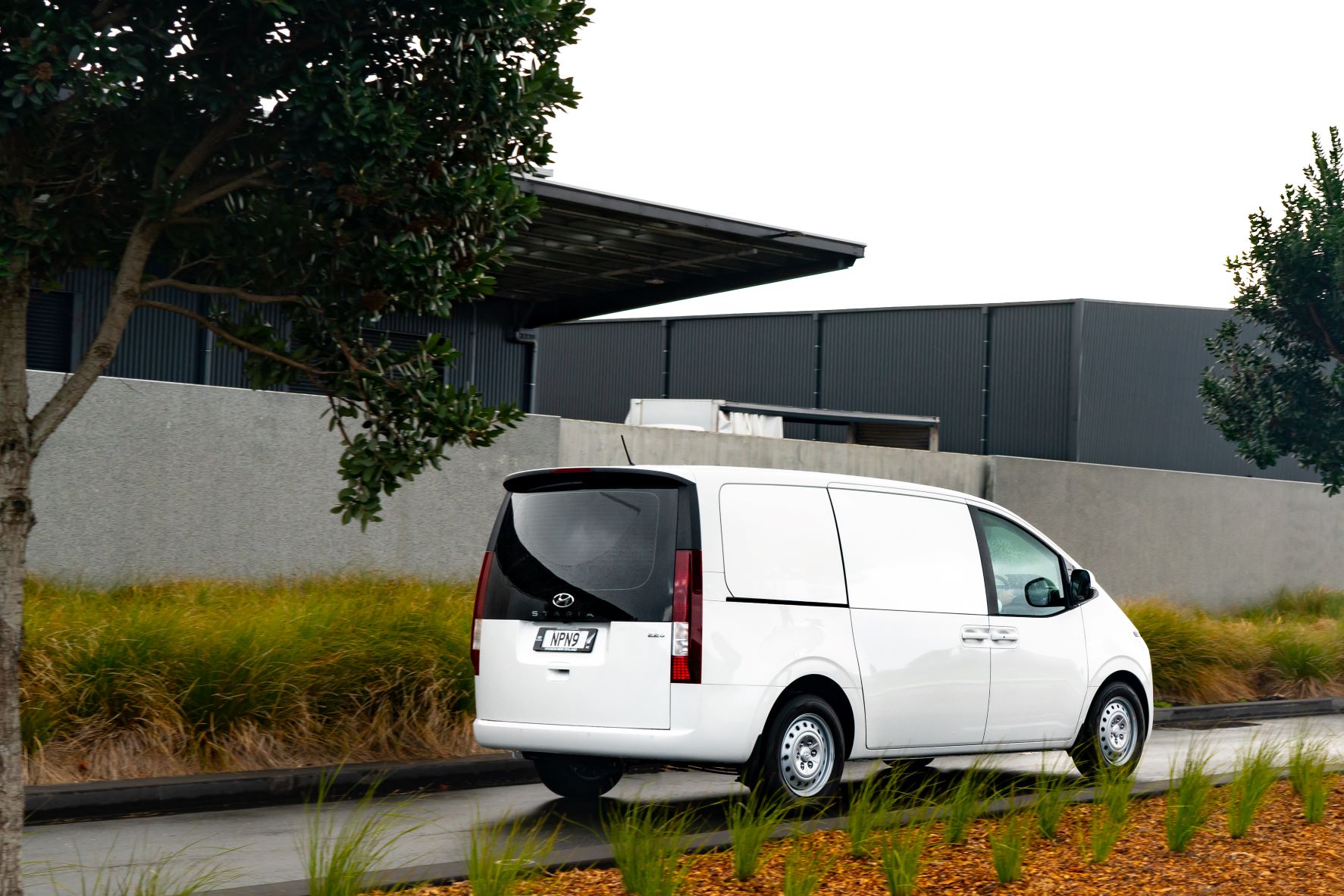 Rear three quarters view of Hyundai's Staria Load in white