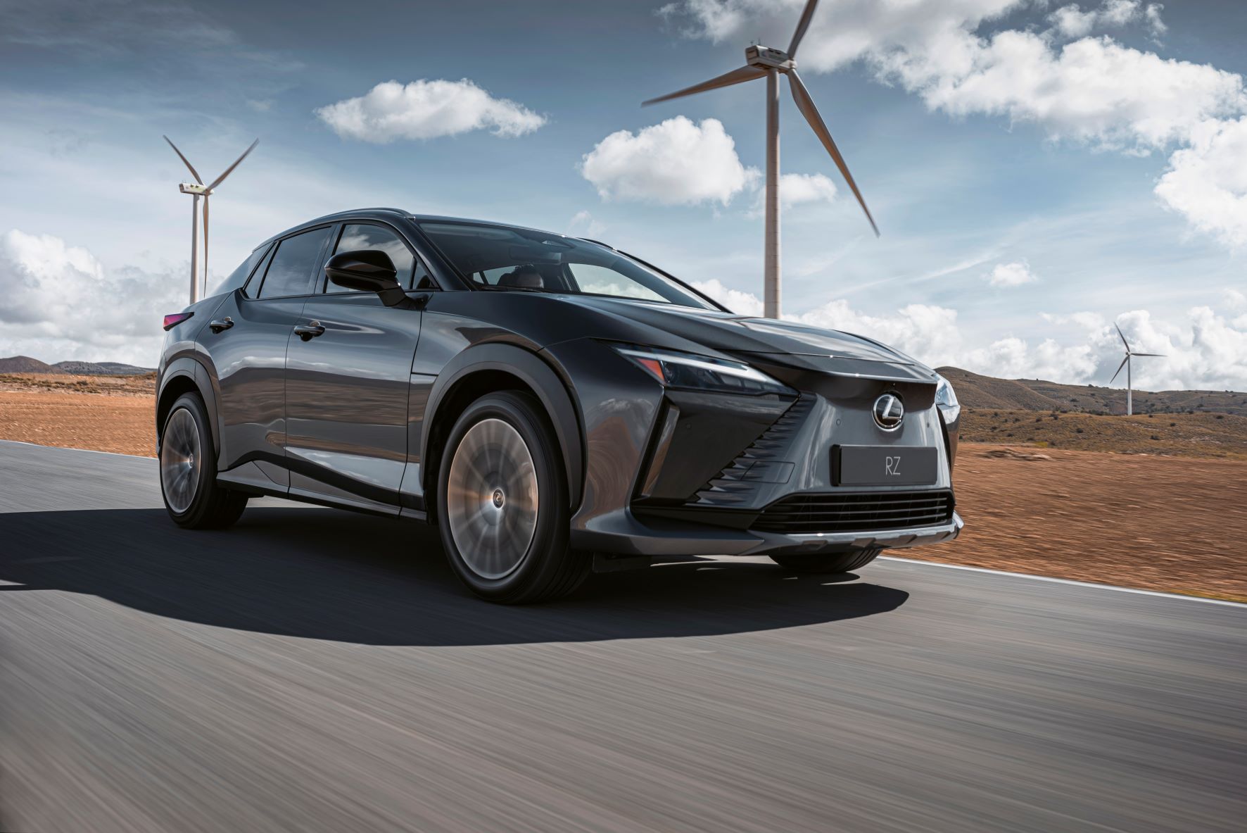Front three quarters view of a new Lexus RZ 450e EV in grey