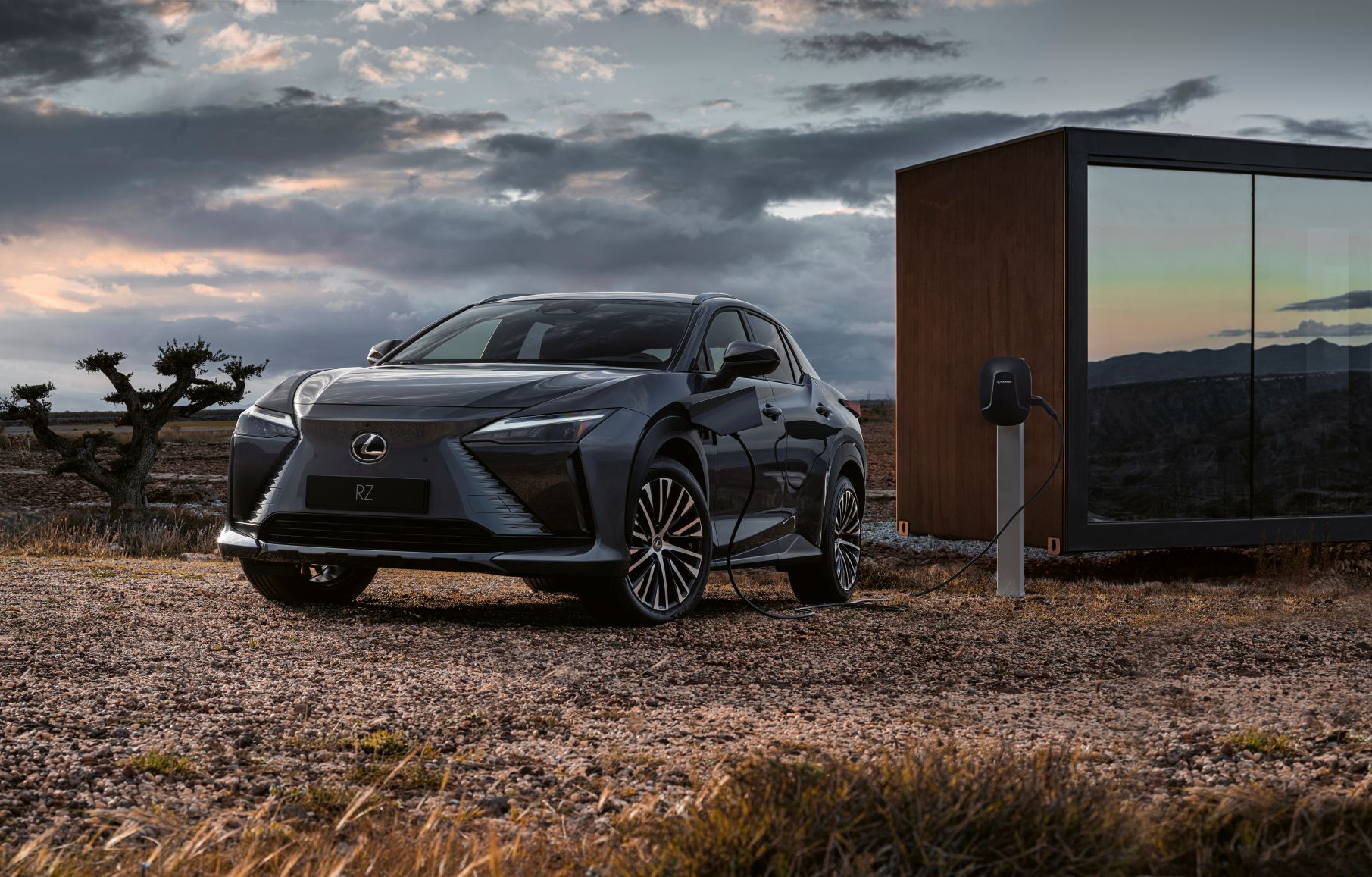 Front three quarters view of the Lexus RZ450e charging