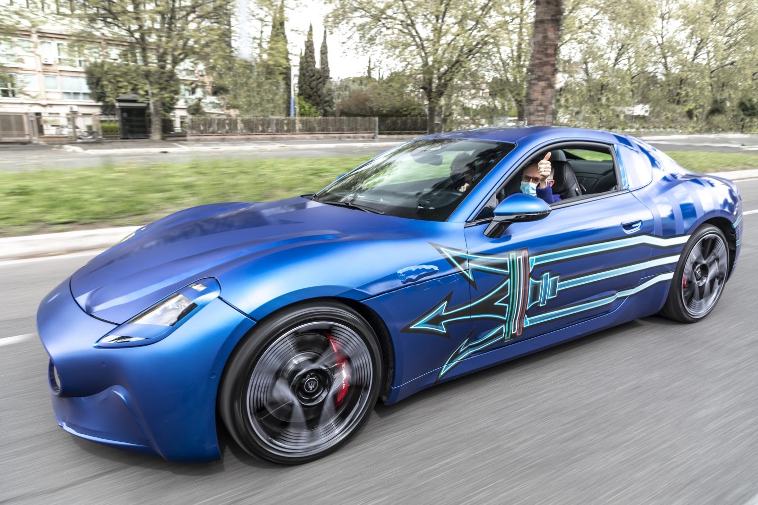 Stellantis CEO Carlos Tavares driving a Maserati GranTurismo Folgore