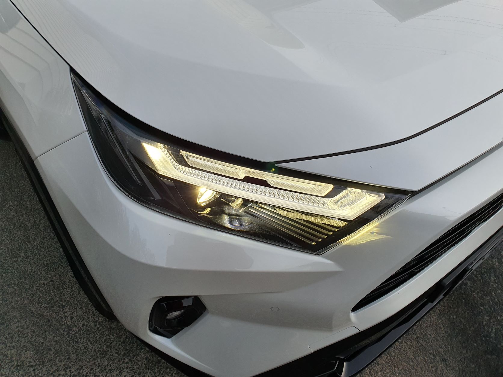 View of the headlight on the new Toyota RAV4 Hybrid XSE