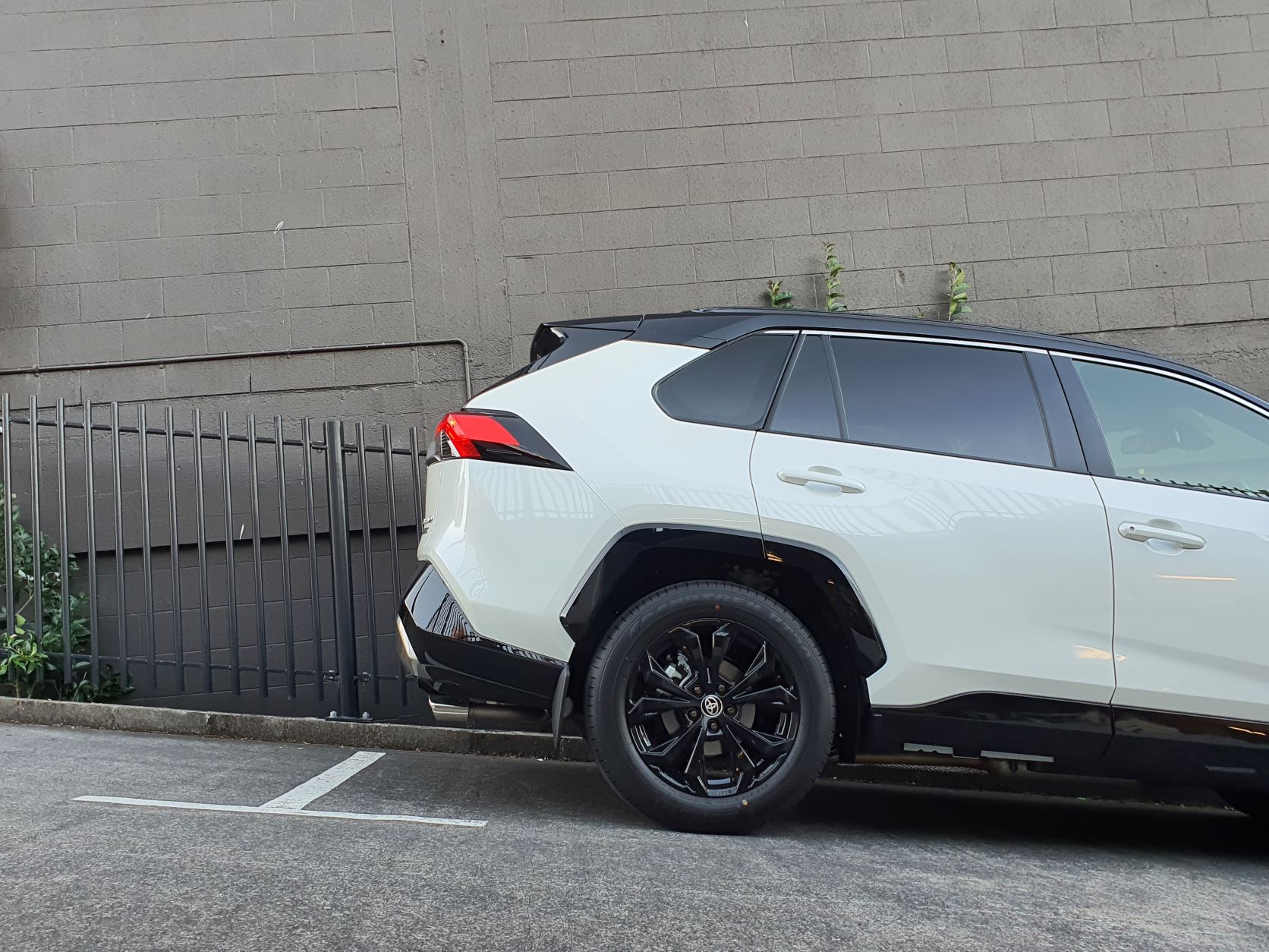 Side rear quarter view of the Toyota RAV4 Hybrid XSE