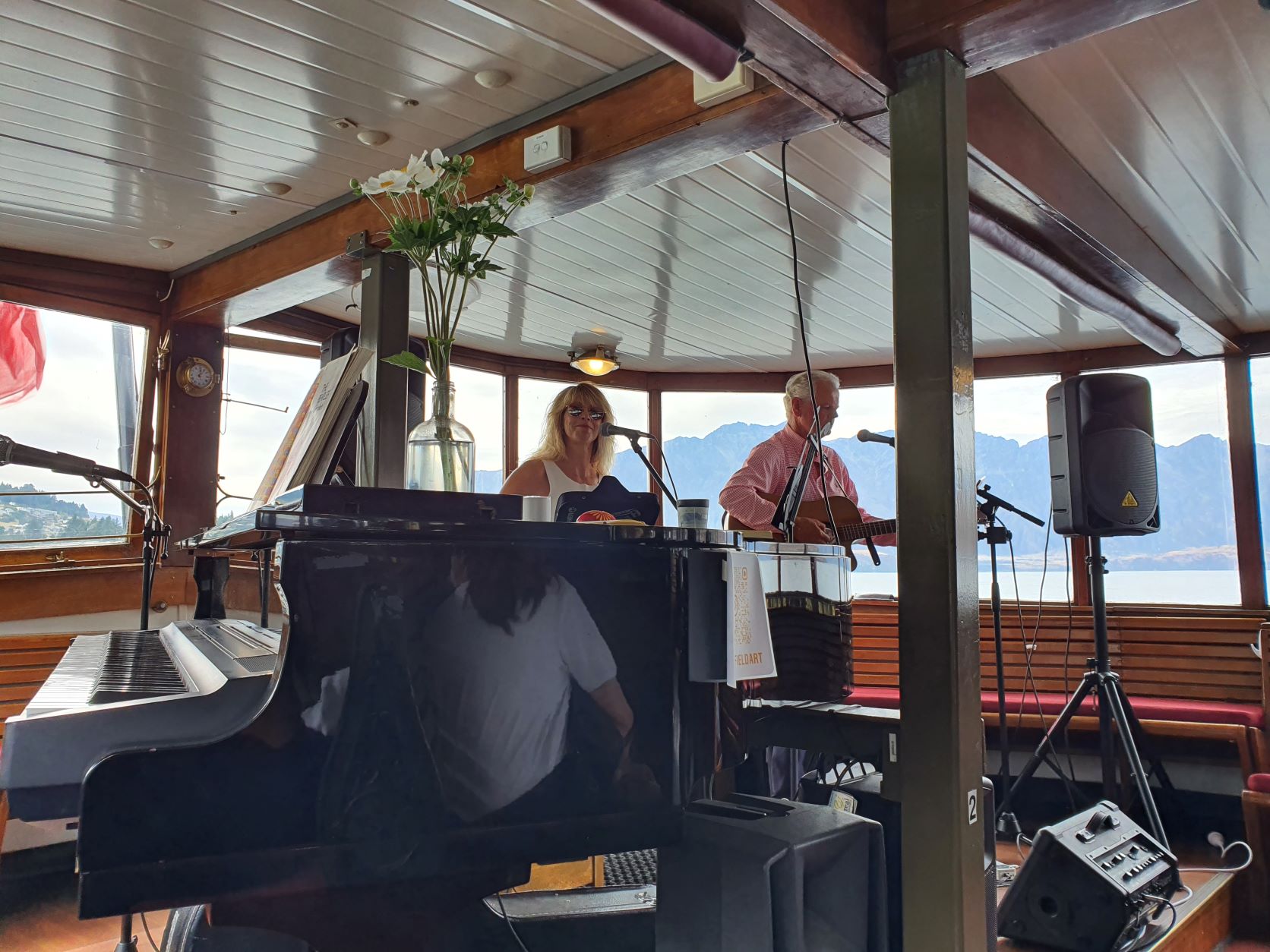 Kate and Tony in charge of the music aboard the TSS Earnslaw steamship on Lake Wakatipu in Queenstown