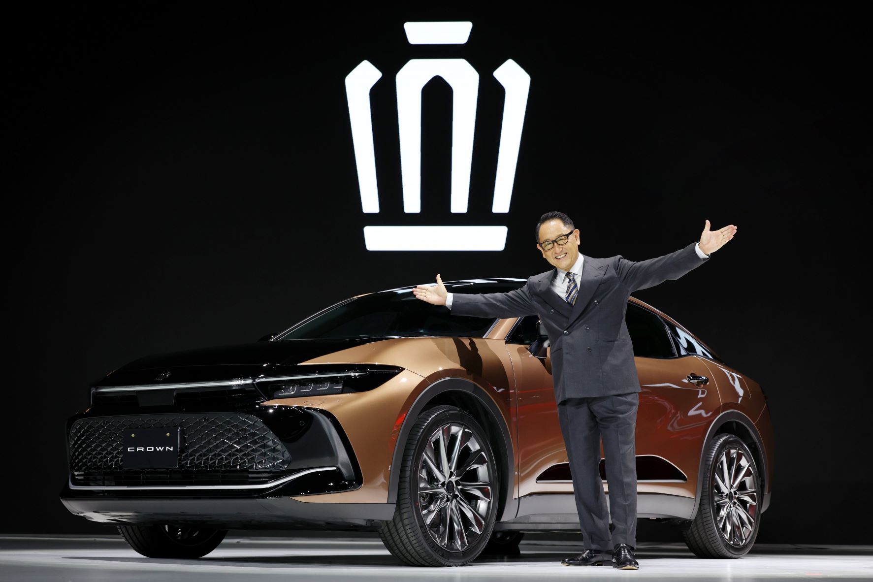 Toyota Crown Crossover and Toyota chief Akio Toyoda pictured