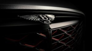 Teaser image of the Bentley logo on the Bentley Mulliner Batur
