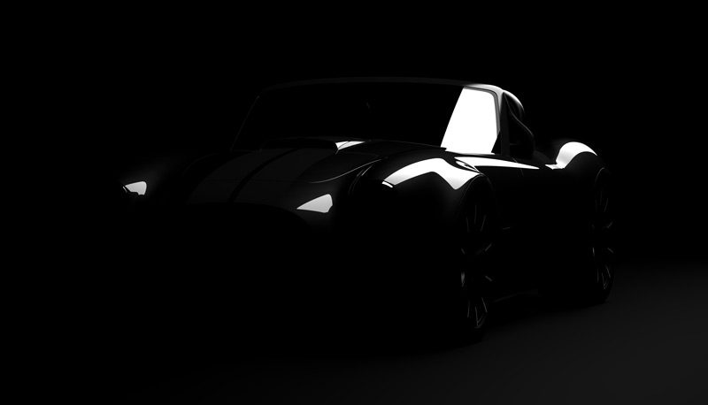 Front three quarters teaser image of the new AC Cars Cobra GT roadster.