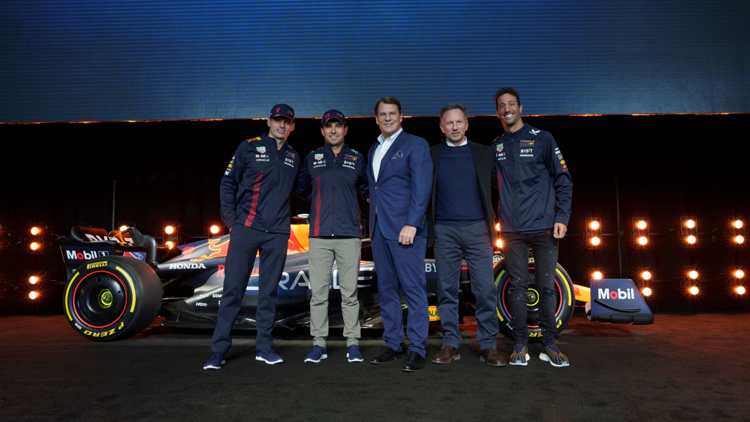 CEO of Ford pictured with Christian Horner, Max Verstappen, Sergio Perez and Daniel Ricciardo of the Red Bull F1 Team.