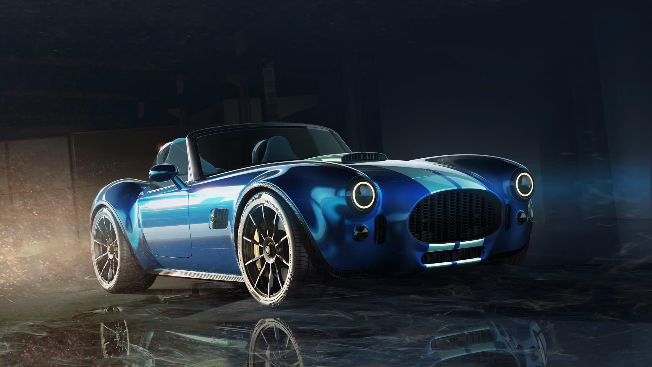 Front three quarters view of the upcoming AC Cobra GT in blue with white stripes