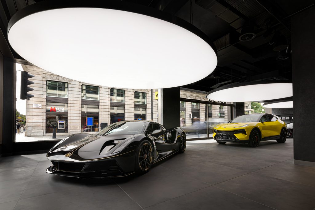A Lotus Evija supercar and Lotus Eletre SUV on display at the Lotus flagship store in Mayfair