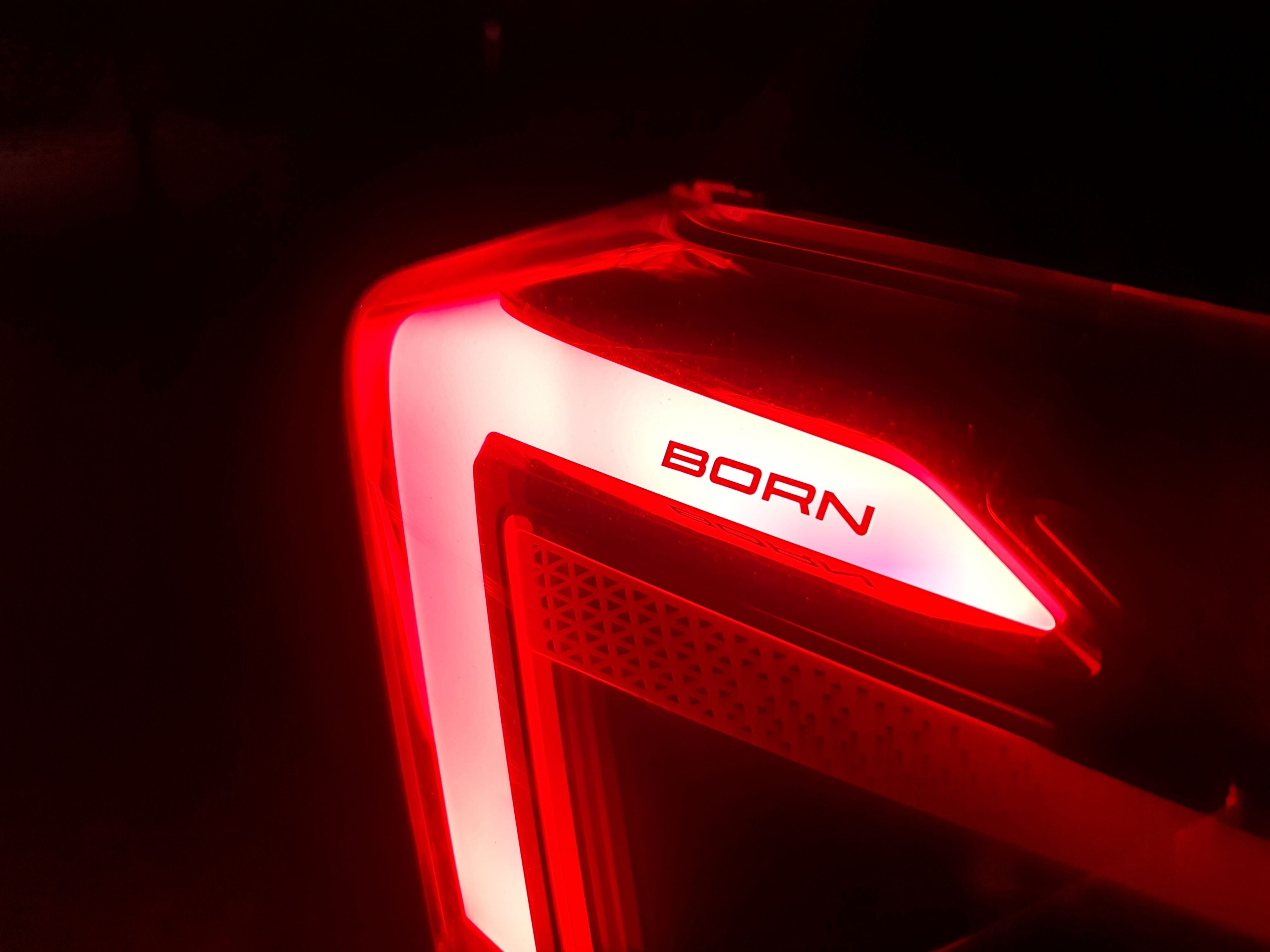A taillight on the 2023 Cupra Born V+ with 'Born' highlighted within the light.