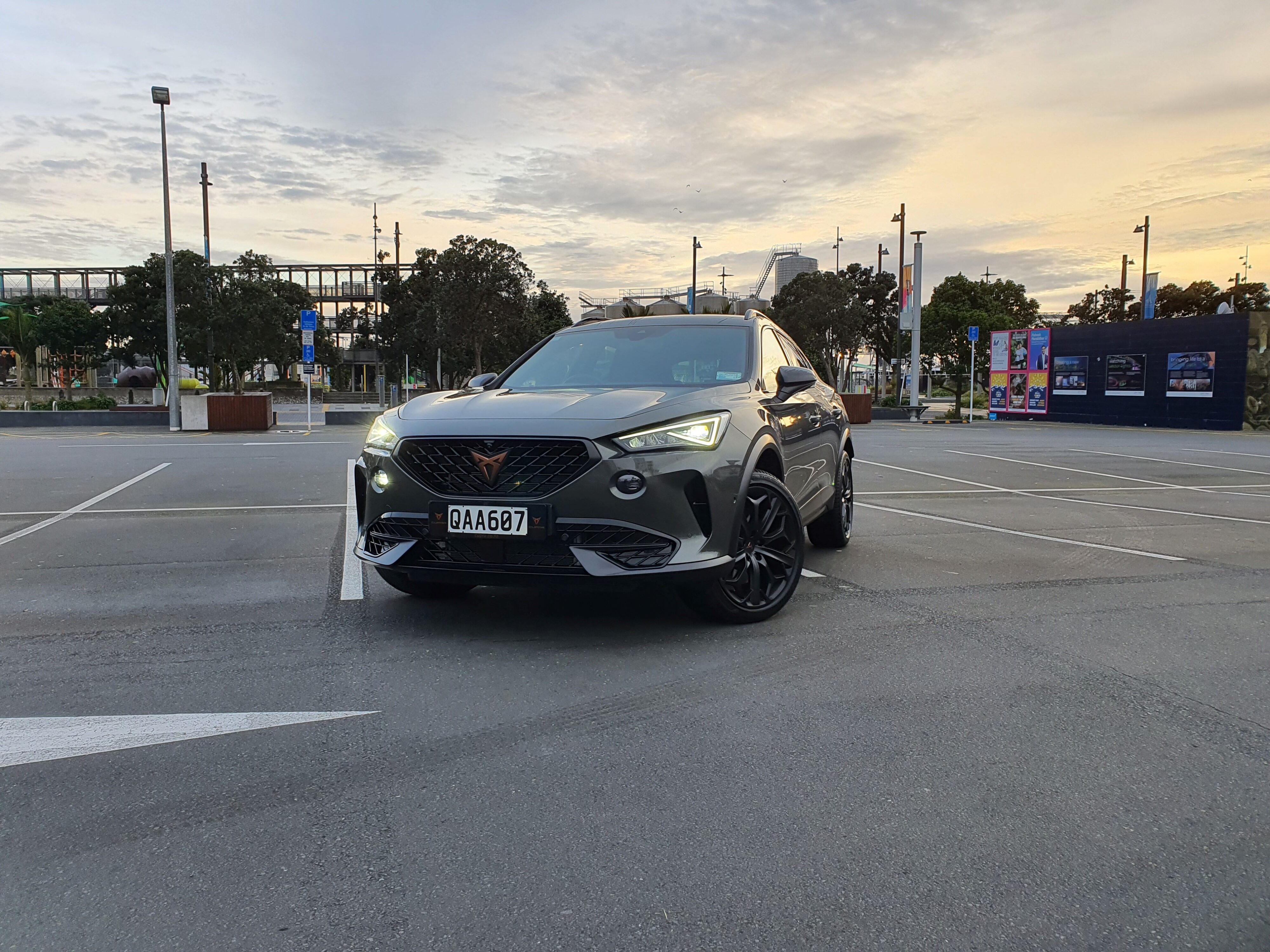 Front three quarters view of a Cupra Formentor VZ Tribe Edition in an urban setting.