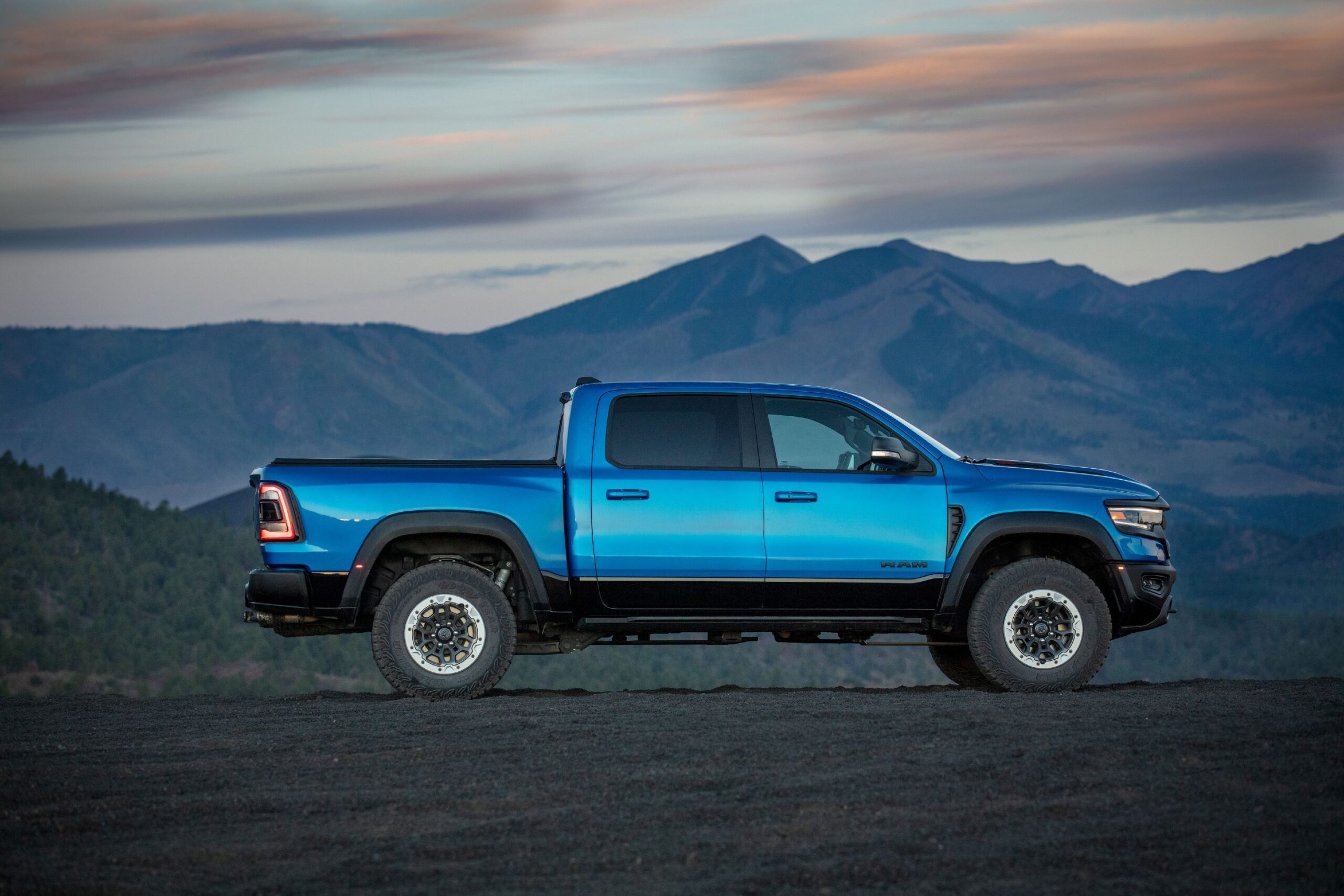 Side on view of a 2024 RAM 1500 TRX in Blue.