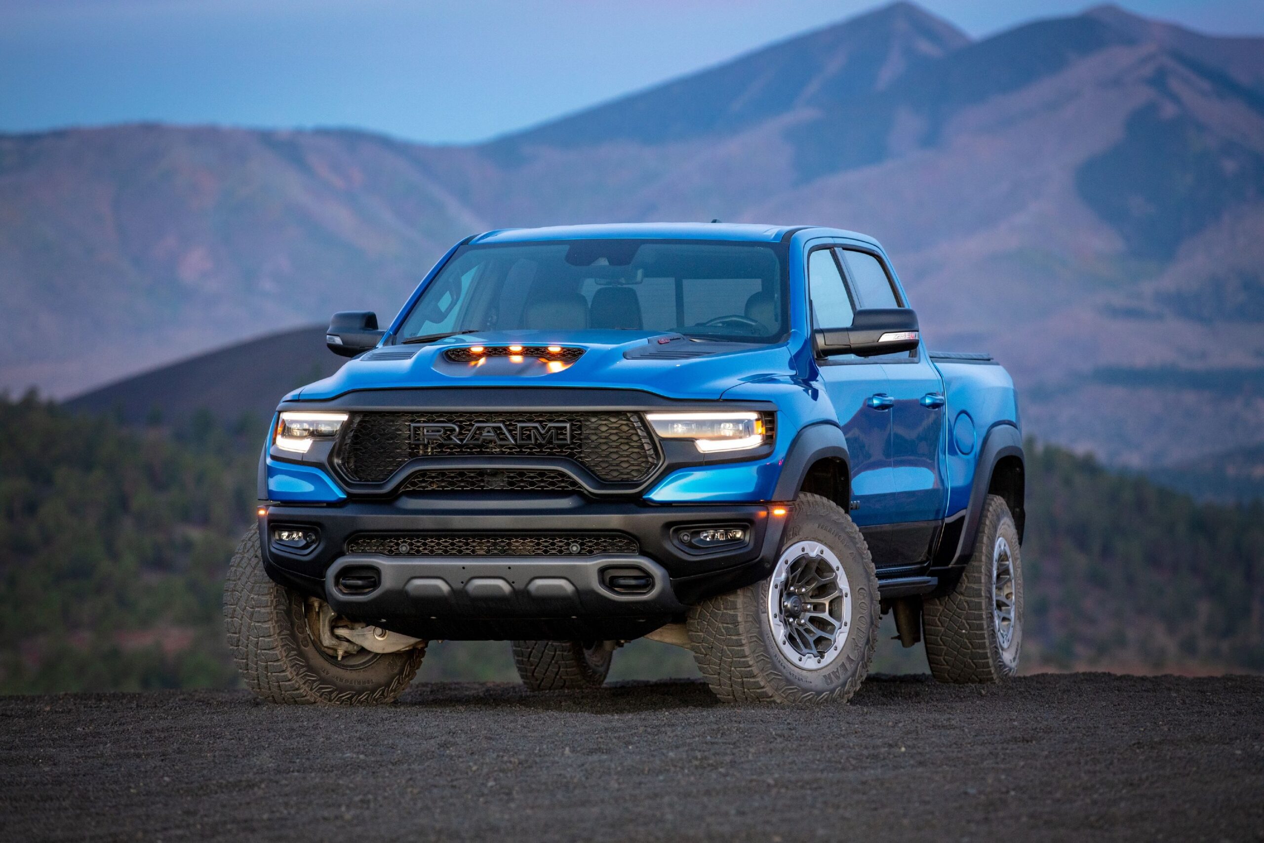 Front three quarters view of a 2024 RAM TRX 1500 in Blue.