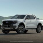 Front three quarters view of a 2023 Ford Ranger PHEV in White.