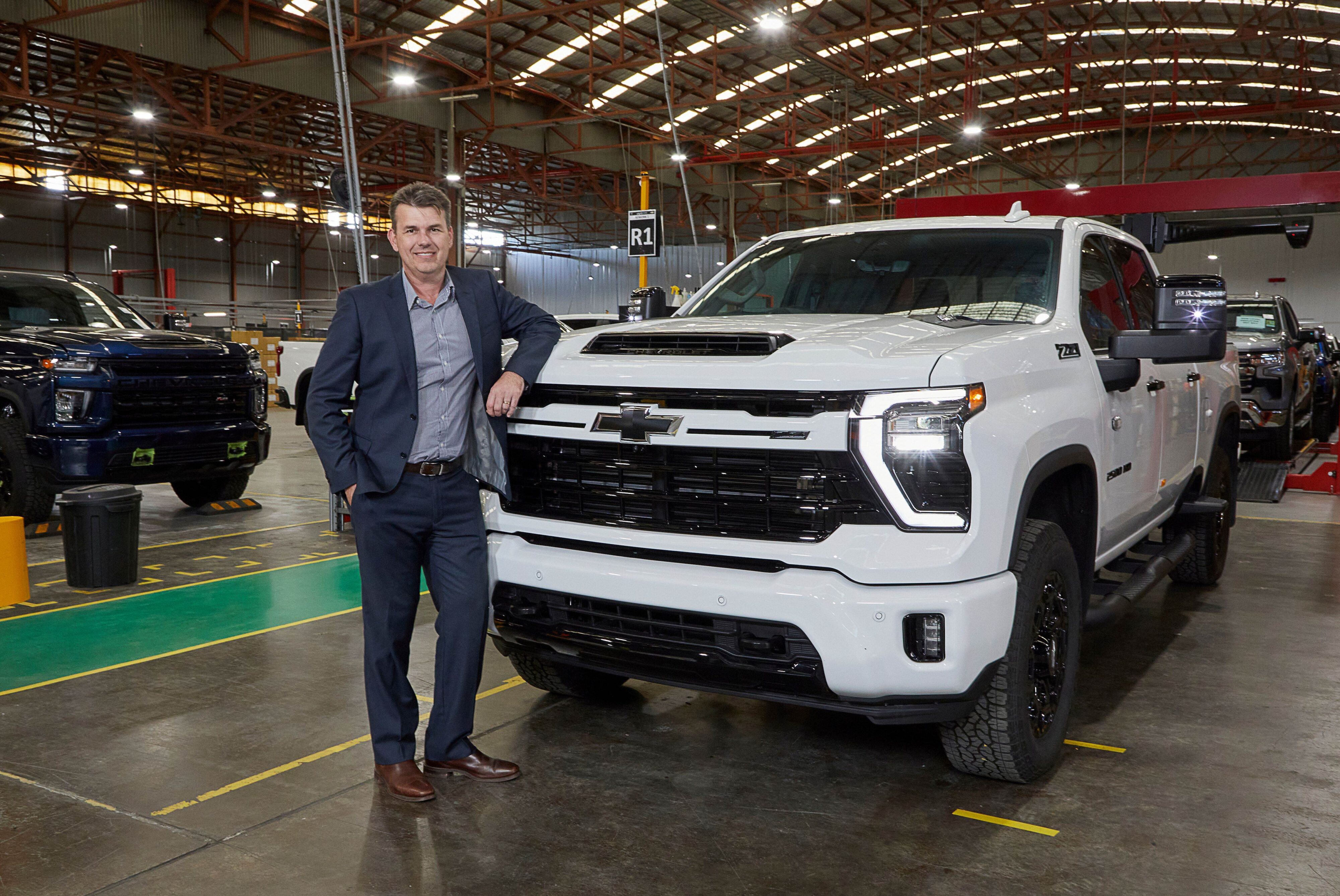 GMSV Director Greg Rowe posing with the 8,000th remanufactured Chevrolet Silverado. 