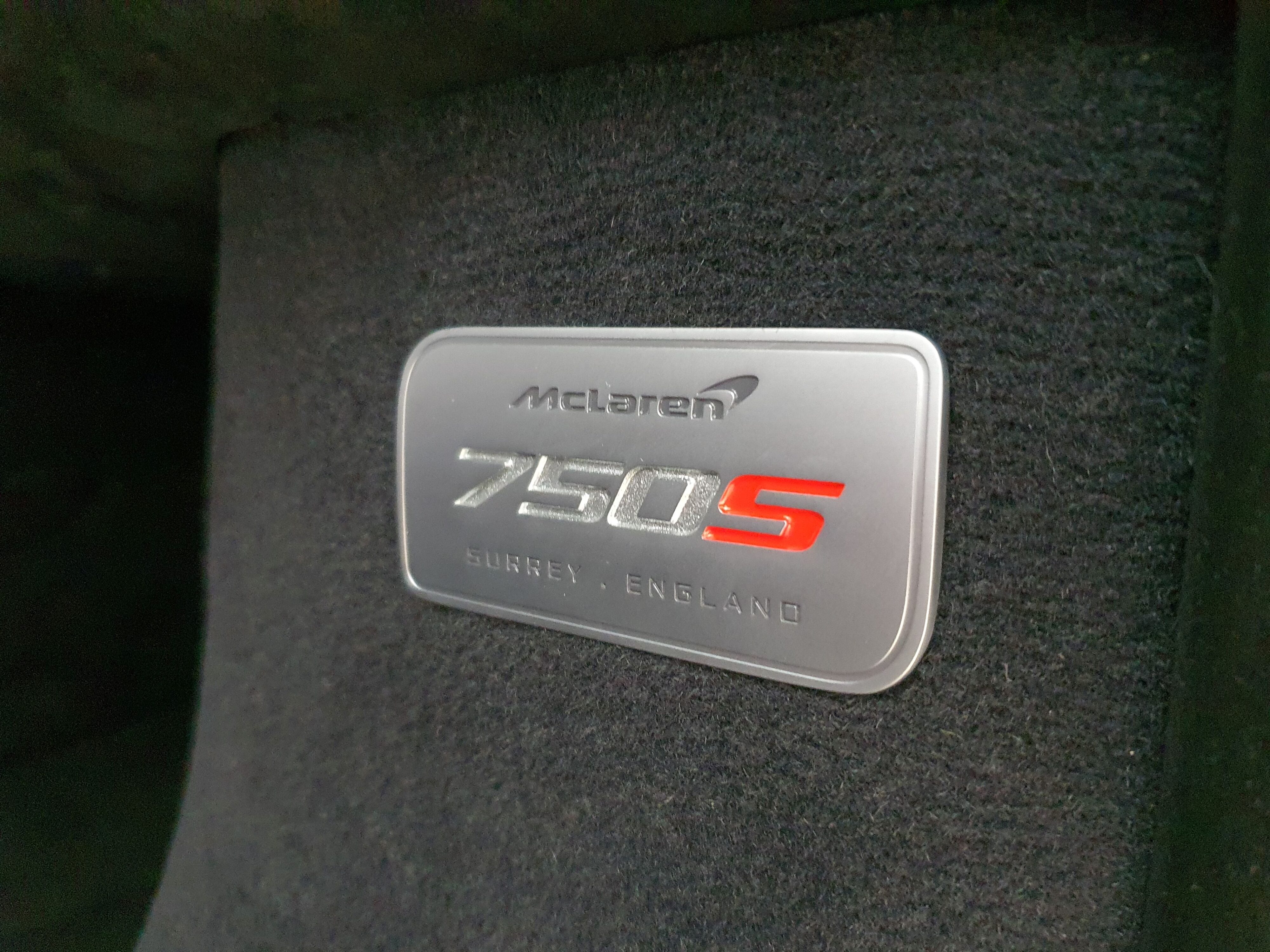 A close up of the McLaren 750S badge on the new McLaren 750S badge at McLaren Auckland.