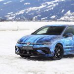 Promotional photo of a camouflaged Volkswagen Golf R MK8 on ice.