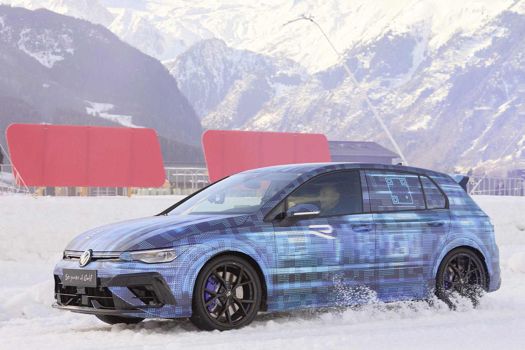 A camouflaged Volkswagen Golf R Mk8 on the Ice Race in Austria.