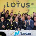 An image of Lotus going public on NASDAQ with senior staff members celebrating.
