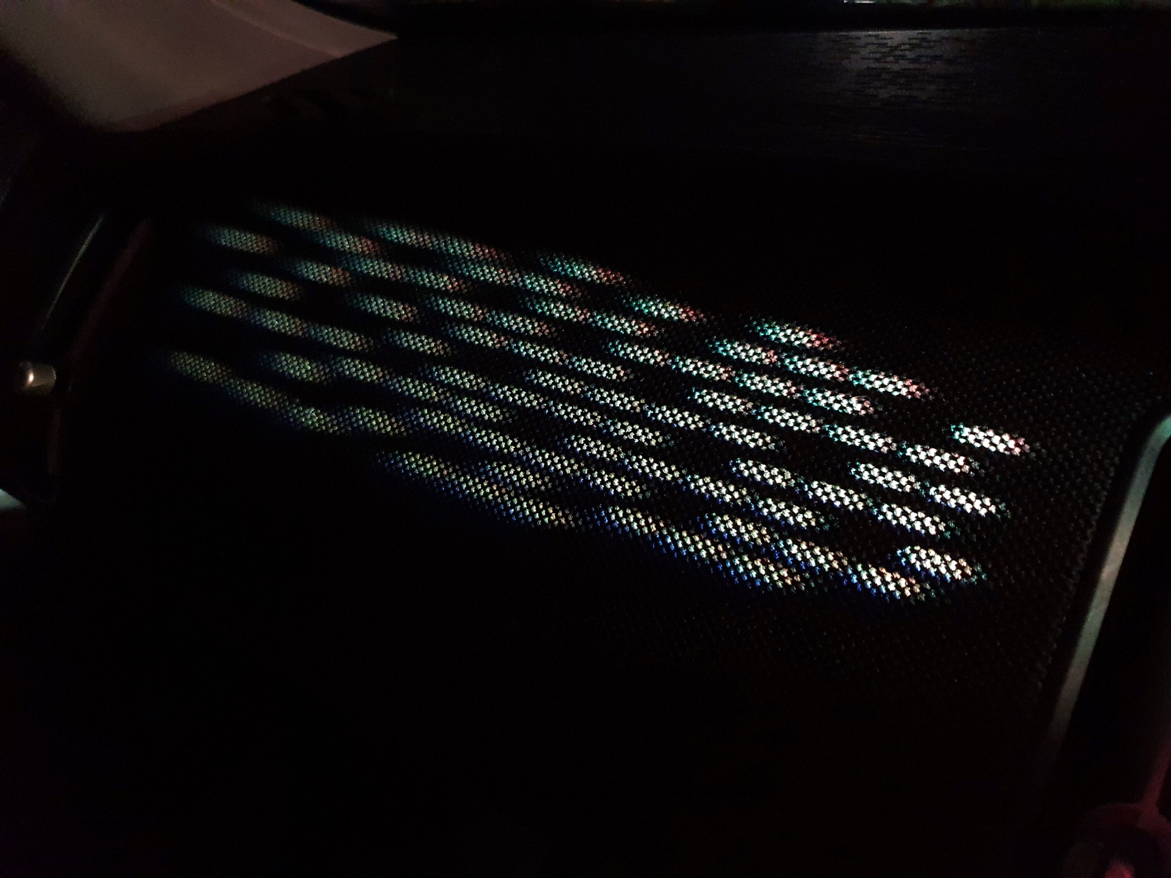 Light projections on the dashboard of a 2024 Mini Countryman C Classic.