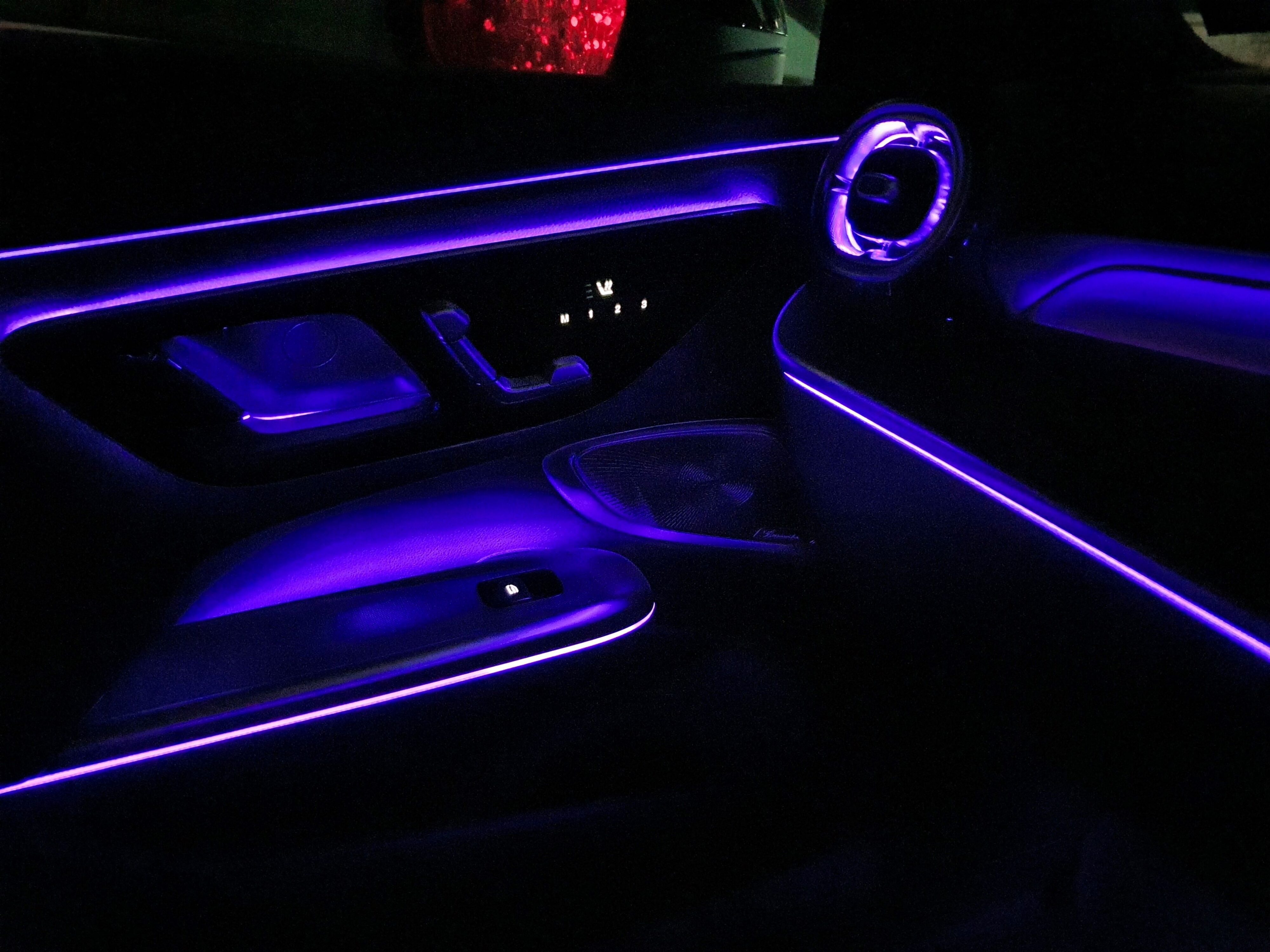 Photo of purple ambient interior lighting on the inside of a 2024 Mercedes-Benz CLE300 4MATIC.