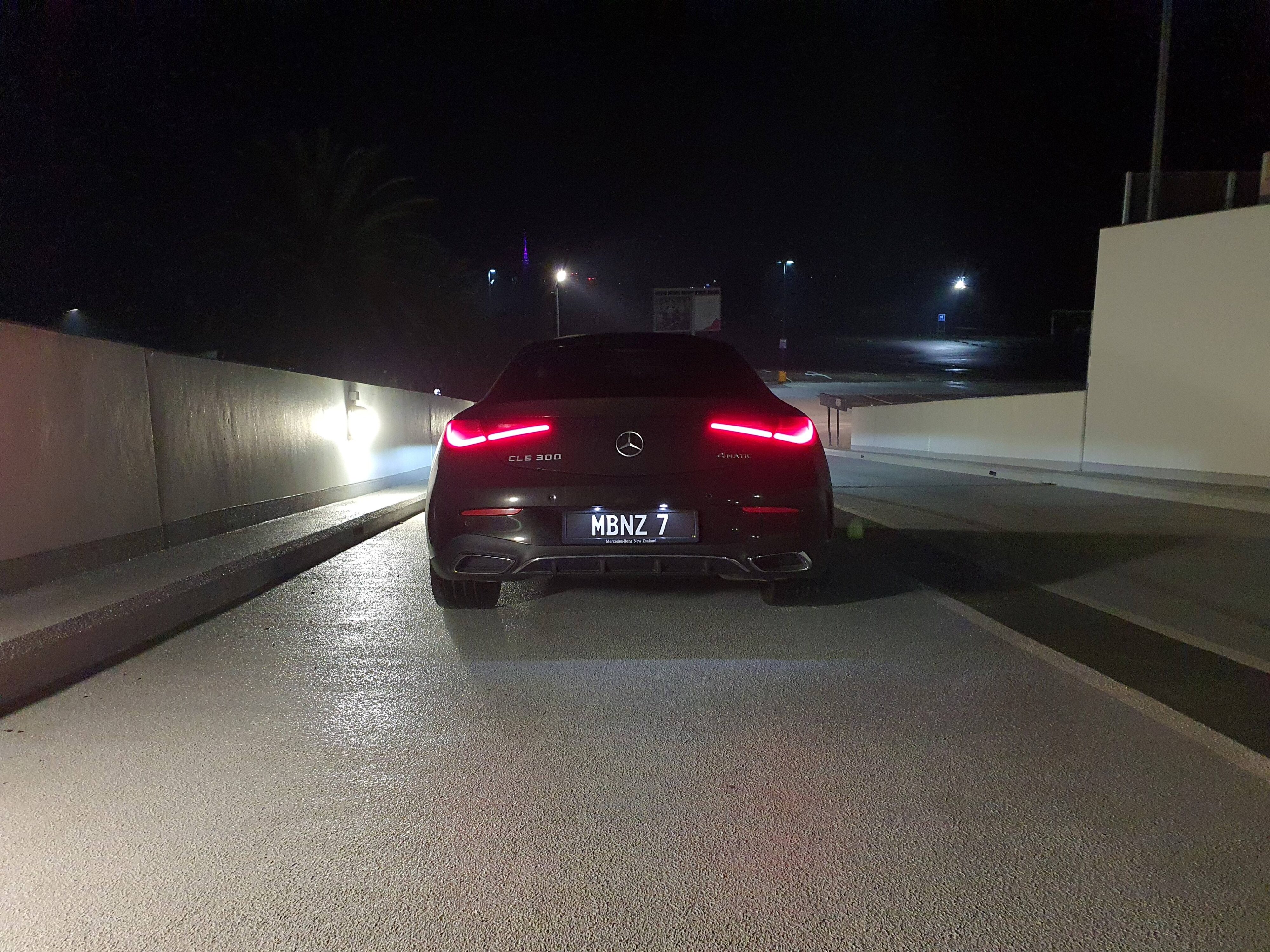 Rear view of a 2024 Mercedes-Benz CLE300 4MATIC in Black.