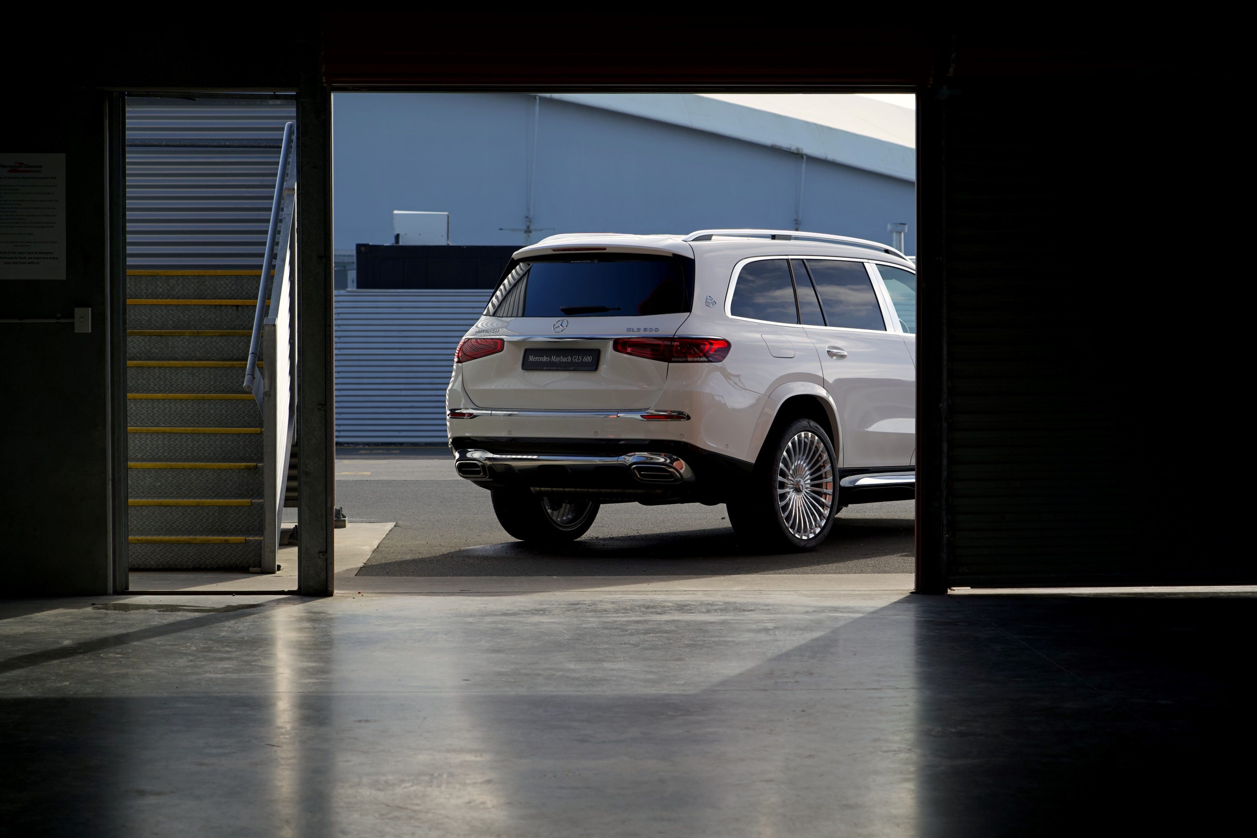 A rear shot of a Mercedes Maybach GLS in white at Hampton Downs at the Mercedes-Benz Driving Event in August 2024.
