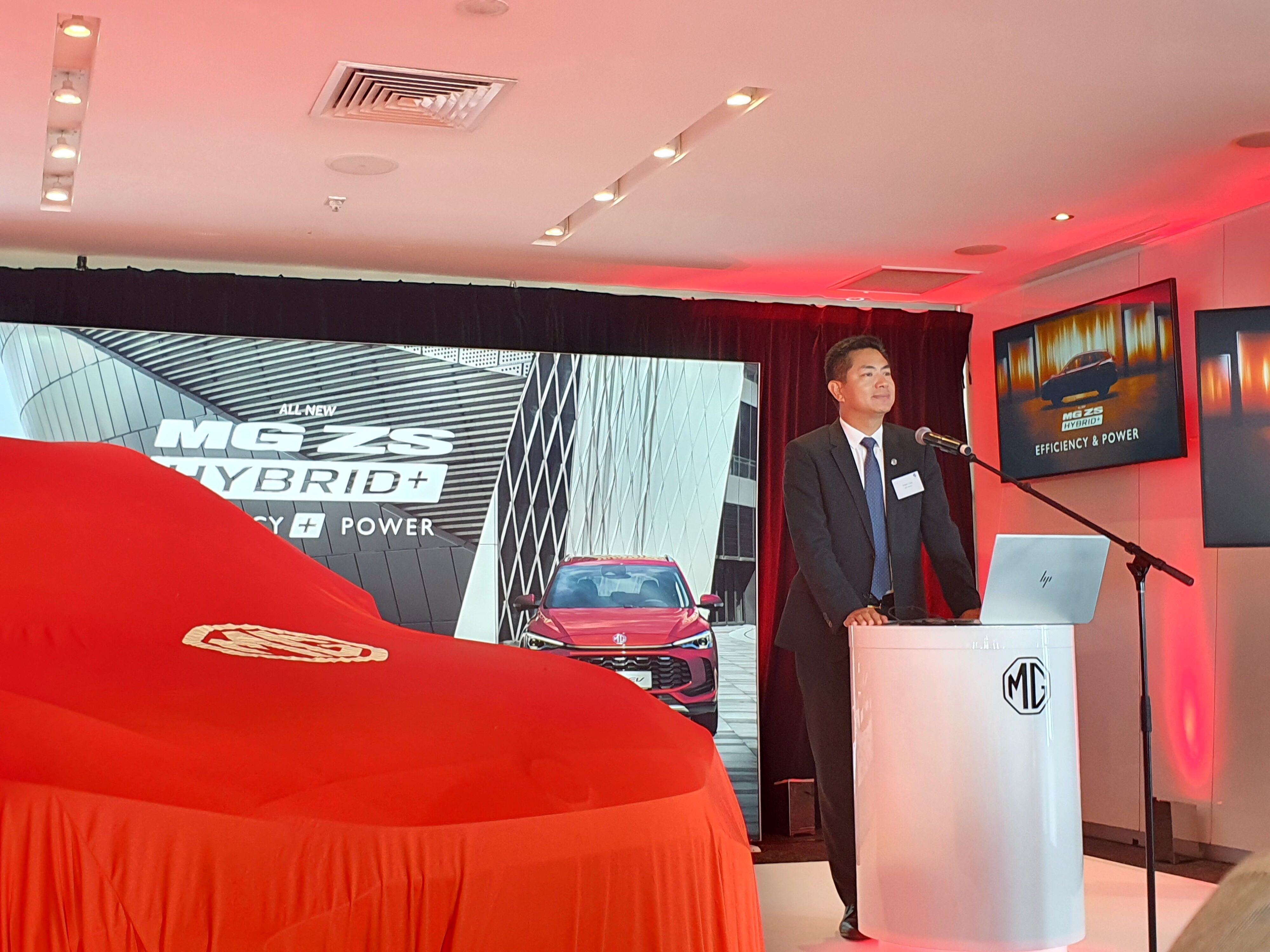 Peter Ciao speaking about the MG brand in New Zealand at the launch of the new ZS Hybrid+.