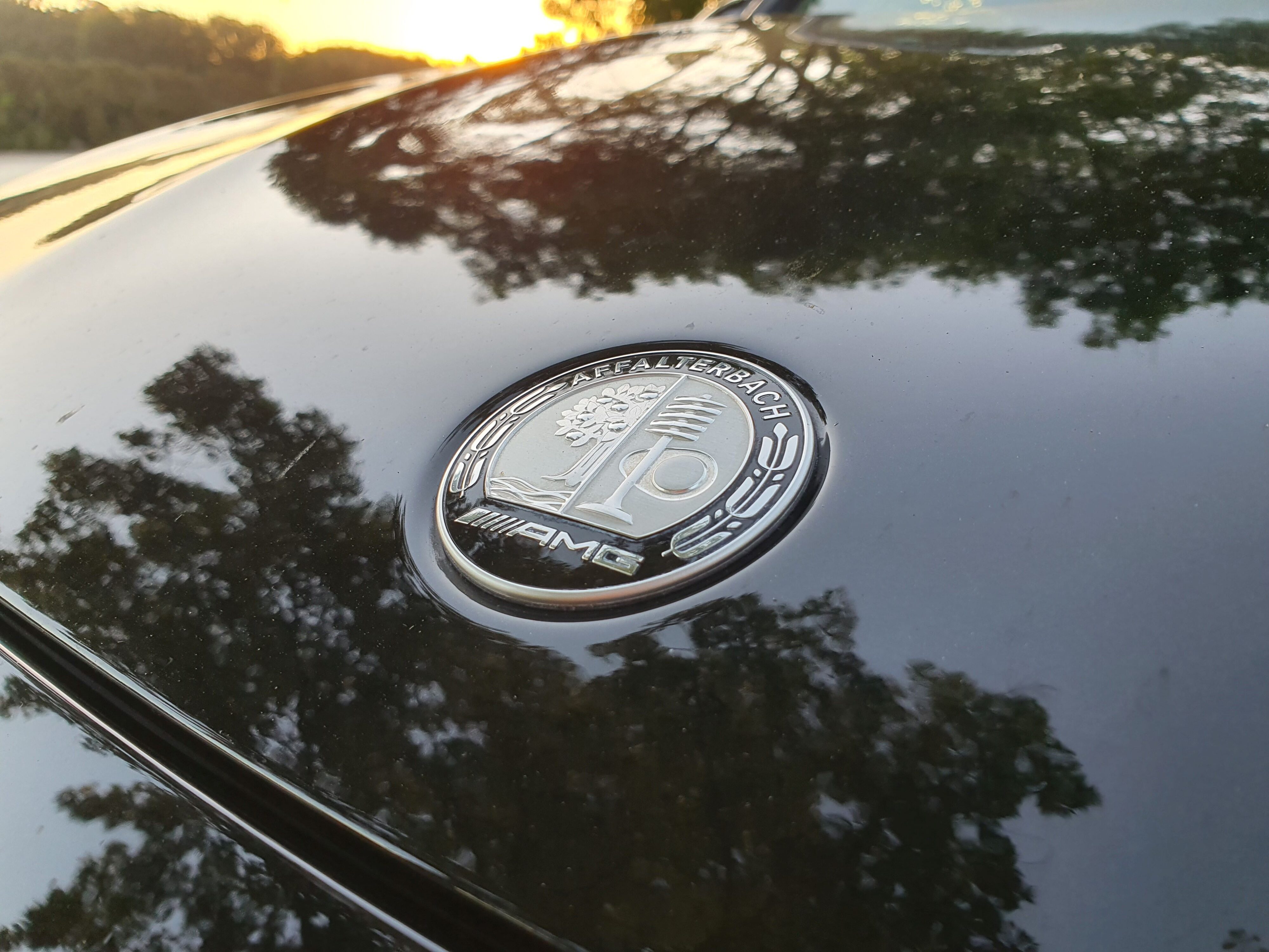 AMG Affalterbach logo on the bonnet of a 2024 Mercedes-AMG GLB 35 4MATIC in Black.