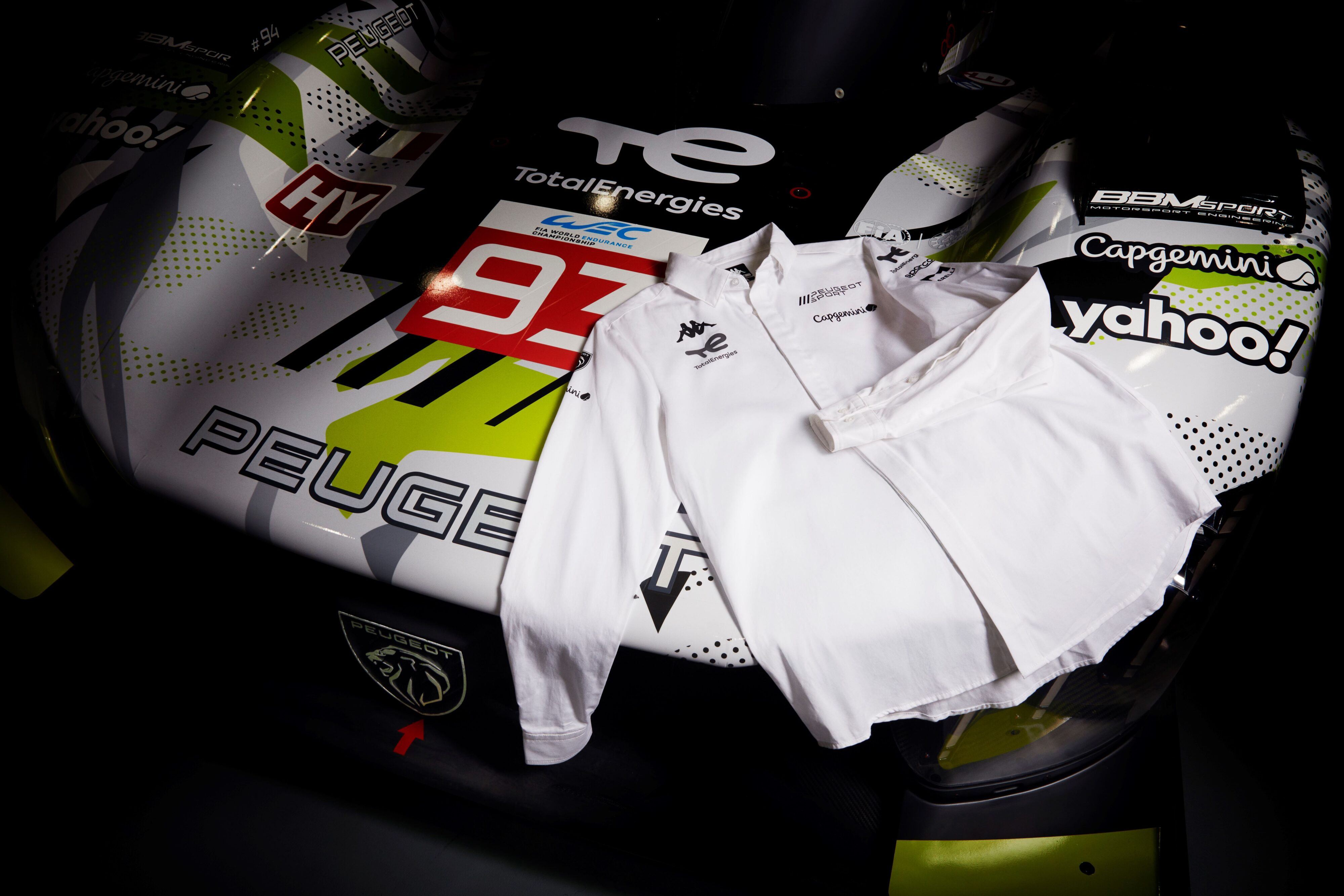 The new Team Peugeot Sport x Kappa shirt draped over the front of the Peugeot Sport Total Energies WEC racecar.