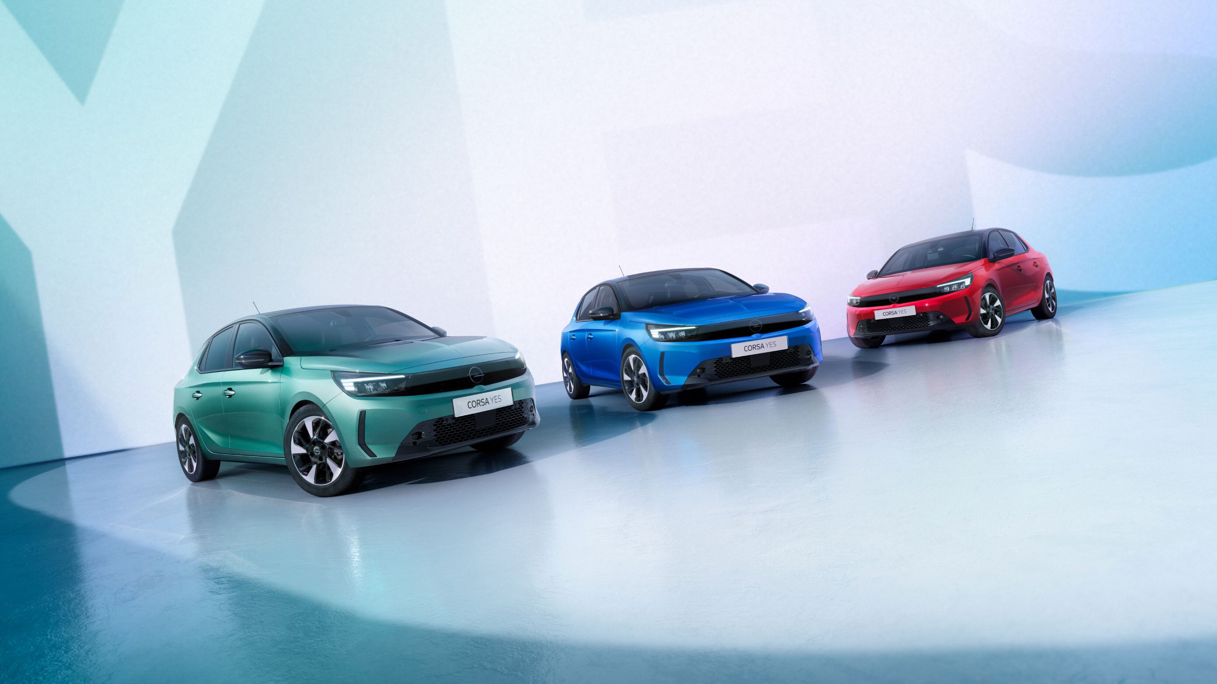 A trio of Opel Corsa YES' pictured in green, blue and red.