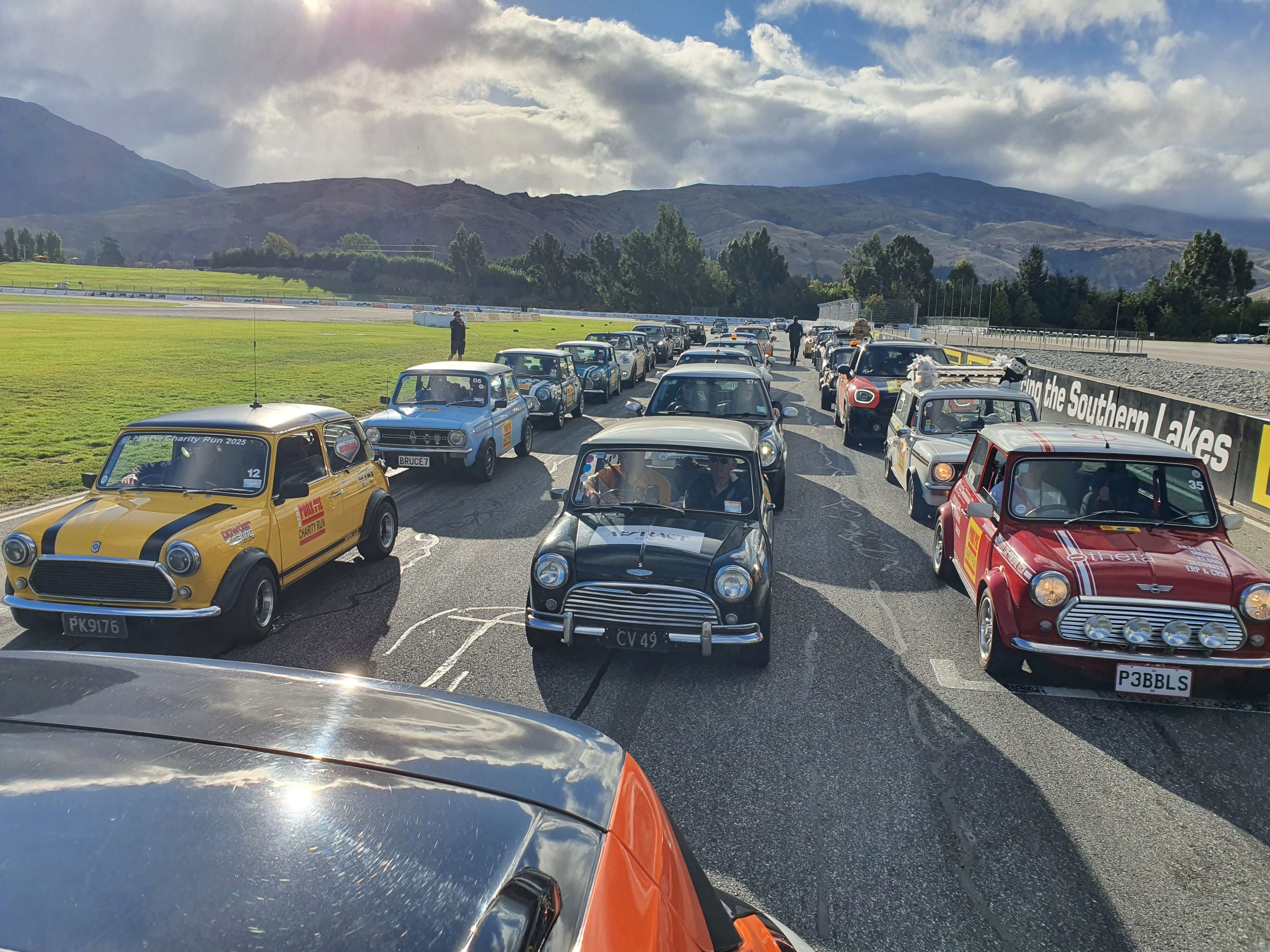 Minis lineup on the start line at Cromwell's Highlands Racetrack on the 2025 Pork Pie Charity Run.