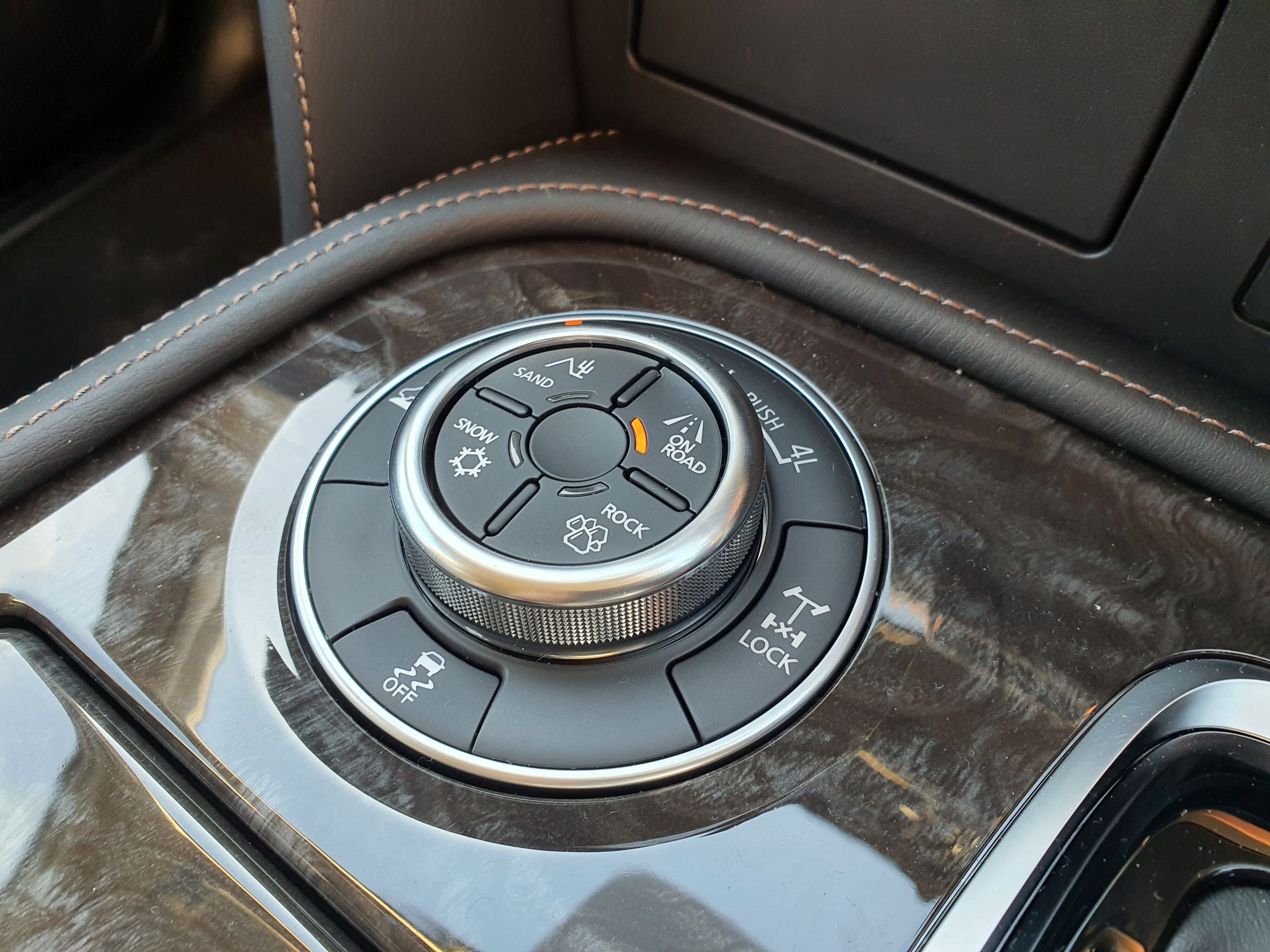 A photo of the rotary dial on the interior of a 2025 Nissan Patrol