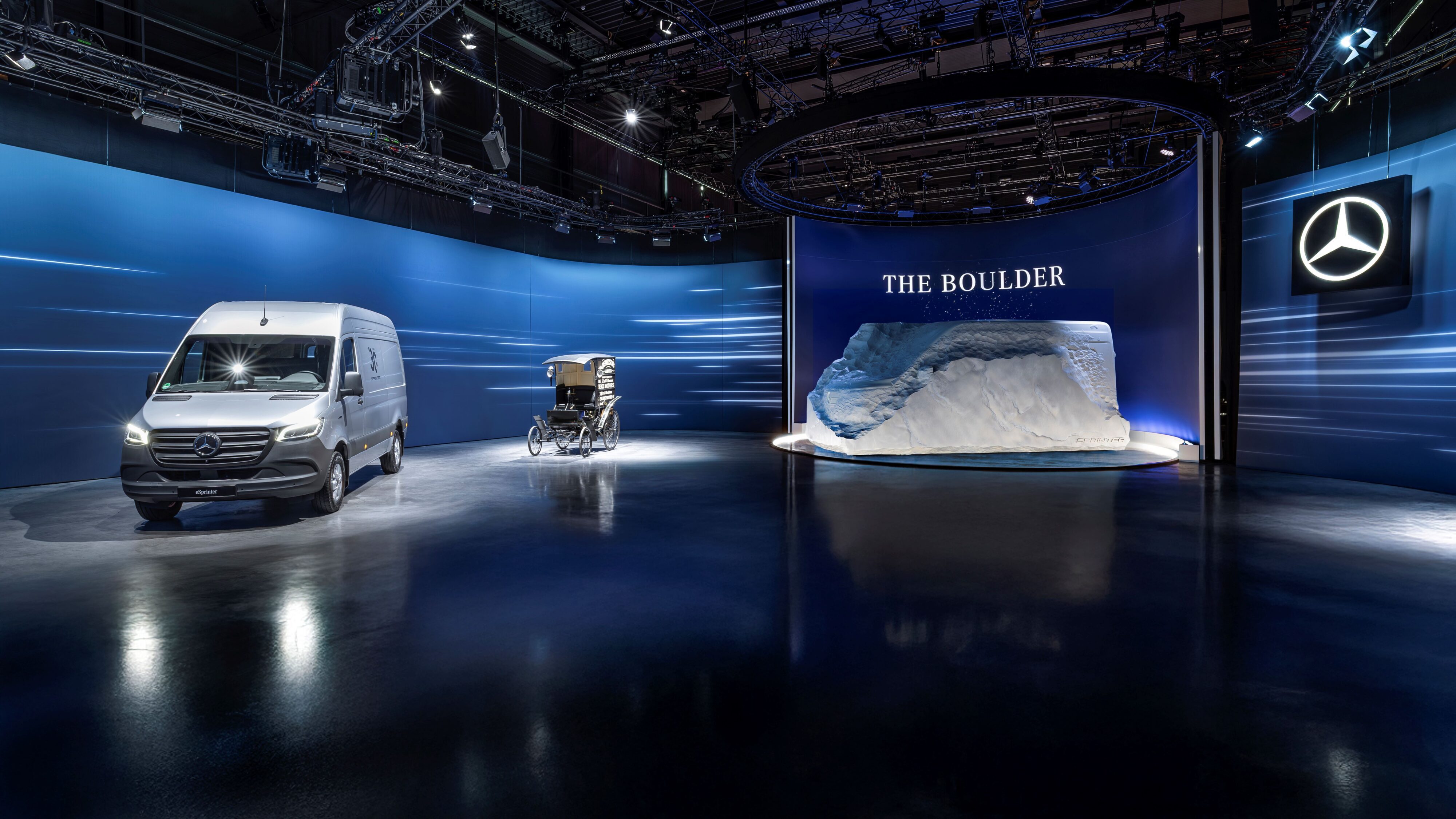 A teaser photo of the next generation Mercedes-Benz Sprinter van alongside the current generation eSprinter and original Mercedes deliver van from 1896.