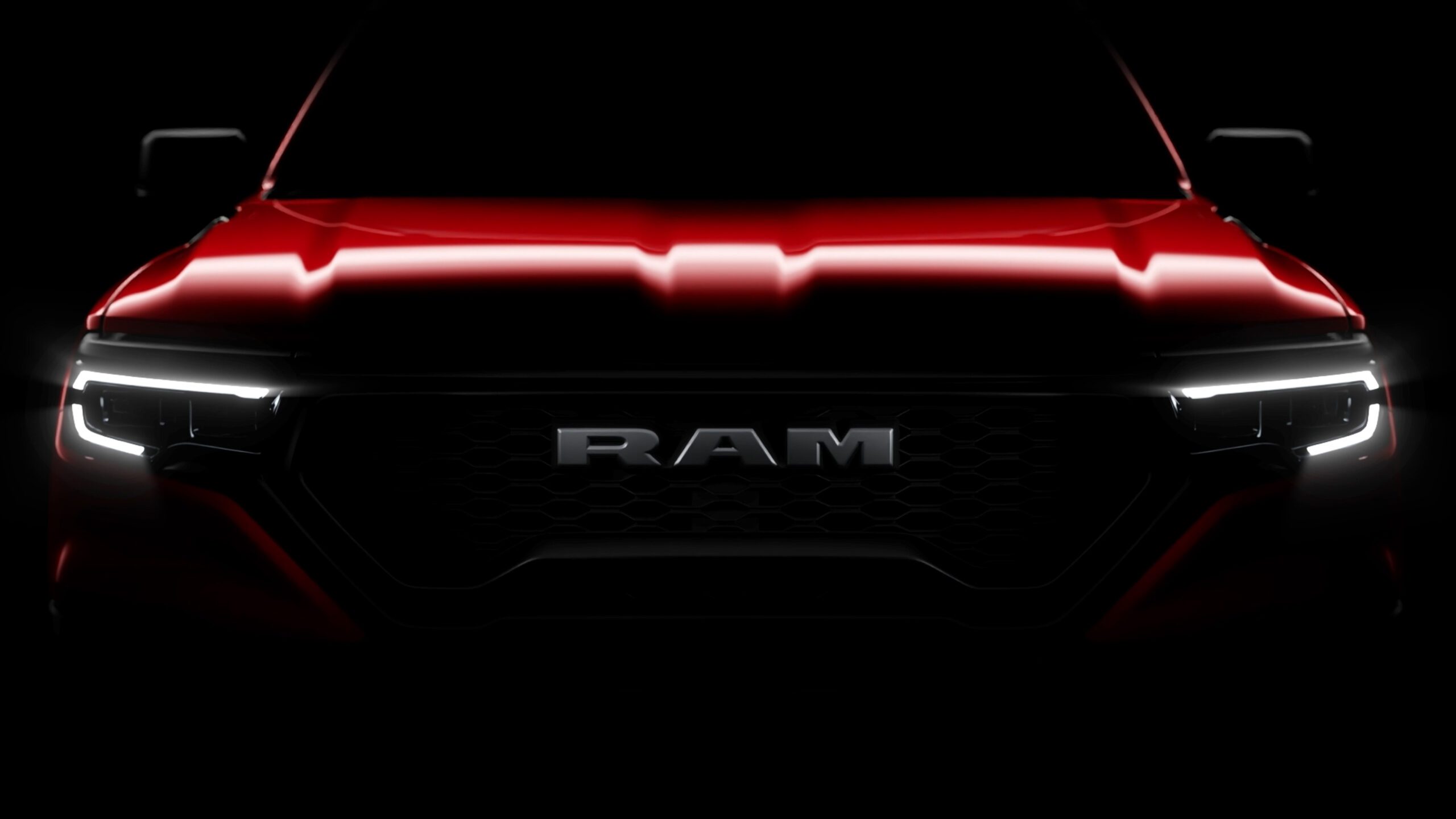 Teaser image of the front-end of a RAM Rampage pickup truck.